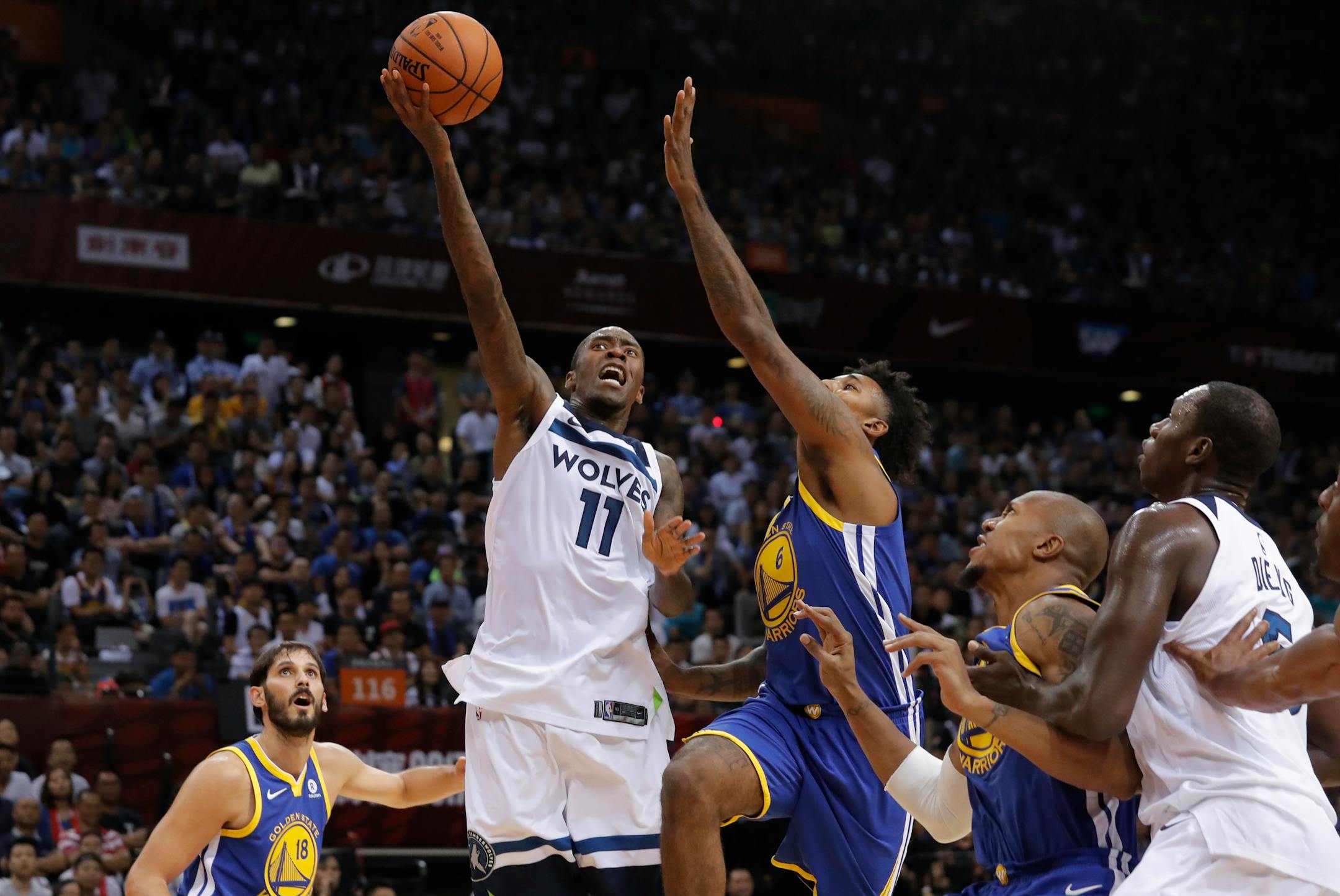 The addition of Jamal Crawford (11) has given the Wolves a capable three-point shooter.