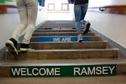 Ramsey Middle School students made their way up a flight of stairs at the school Tuesday, March 17, 2015 in St. Paul, MN. ] (ELIZABETH FLORES/STAR TRI