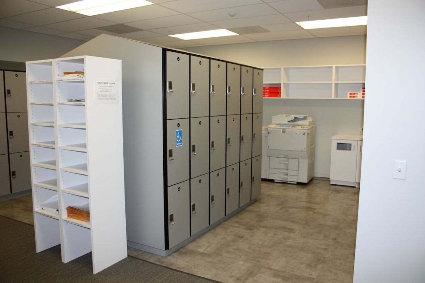 Employees at Siemens' new offices in Orlando put belongings, equipment and their work product in lockers and have the ability to use a different work space every day.