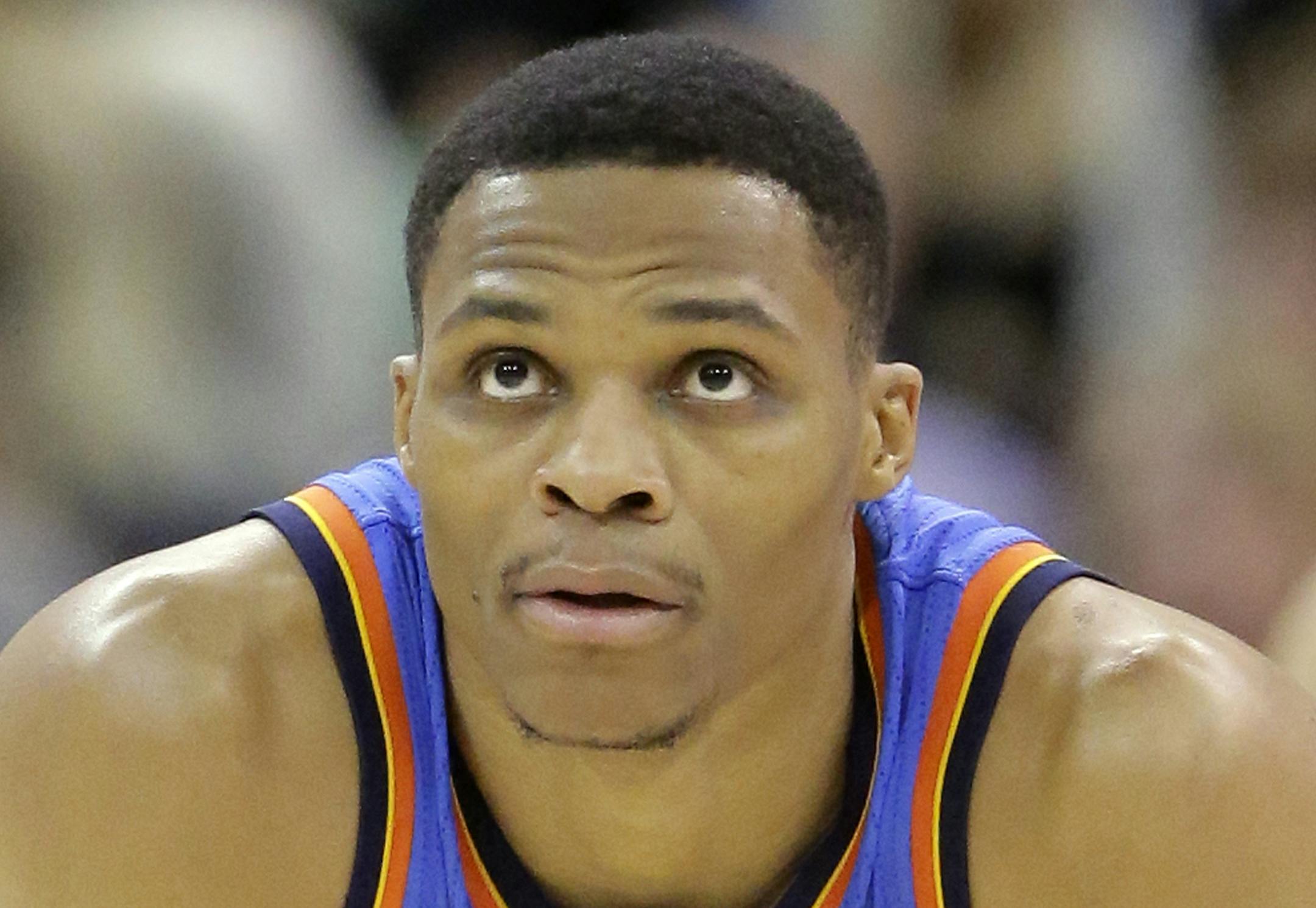 Oklahoma City Thunder guard Russell Westbrook (0) looks on in the second quarter during an NBA basketball game against the Utah Jazz Wednesday, Dec. 14, 2016, in Salt Lake City. (AP Photo/Rick Bowmer)
