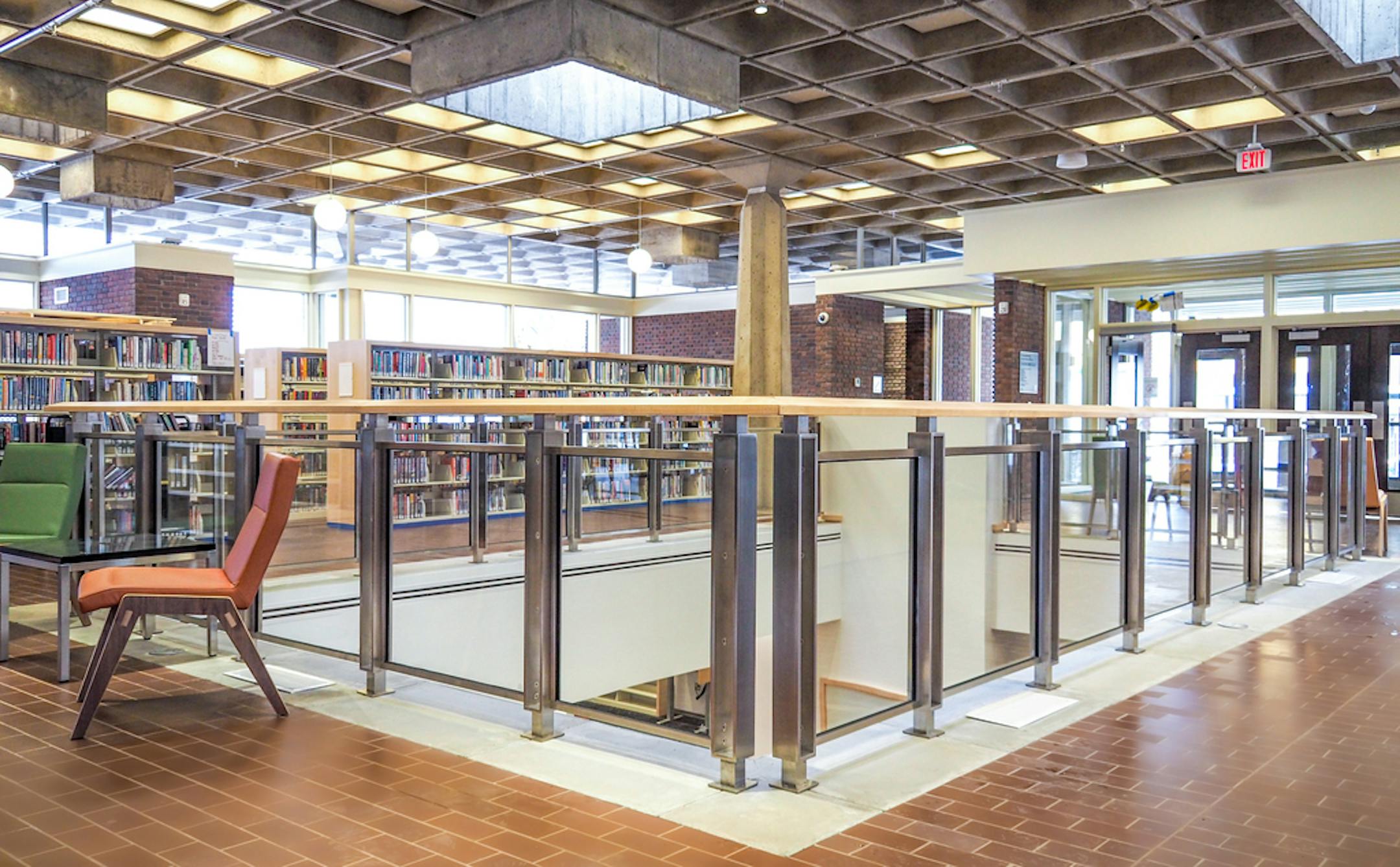 When main-floor interior walls were moved, the building's distinctive dark red-brown bricks were painstakingly salvaged or occasionally replaced with well-matched contemporary iterations.