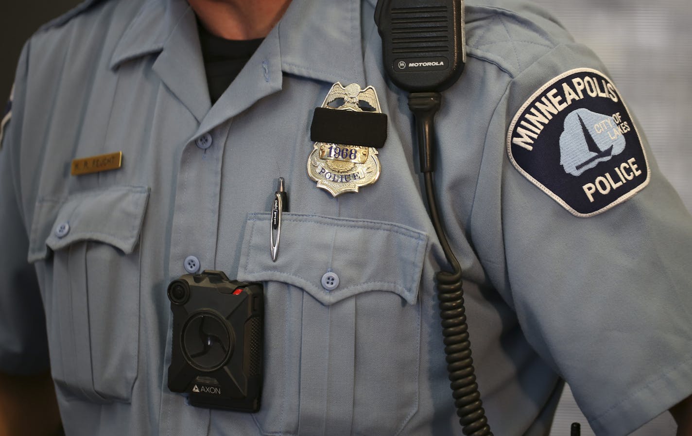 Minneapolis Police Officer Ken Feucht was one of the officers who volunteered for the body camera pilot program. He wore the Axon camera, made by Taser that will be used by the Minneapolis Police Department at the news conference at the First Precinct Police Headquarters Tuesday afternoon. ] JEFF WHEELER &#xef; jeff.wheeler@startribune.com Mayor Betsy Hodges and Police Chief Jane Harteau announced at a news conference Tuesday afternoon, July 19, 2016 that Minneapolis Police Department's Body Cam