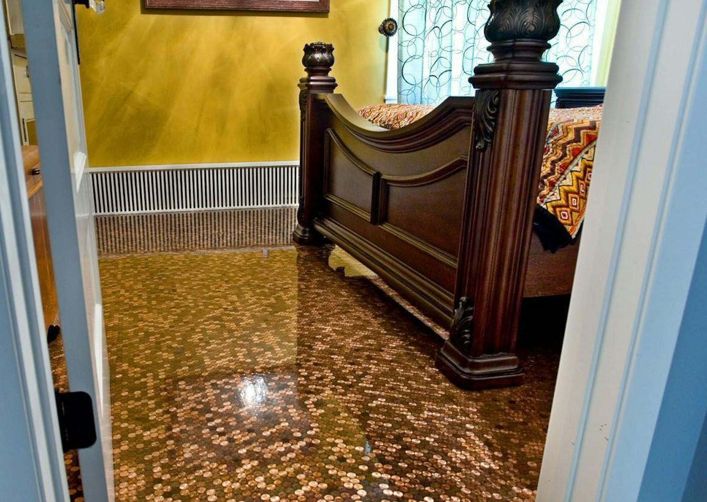 Craig Jansma installed two penny-laden floors in his Minnetonka house. "I had a hankering to do it somewhere," he says.