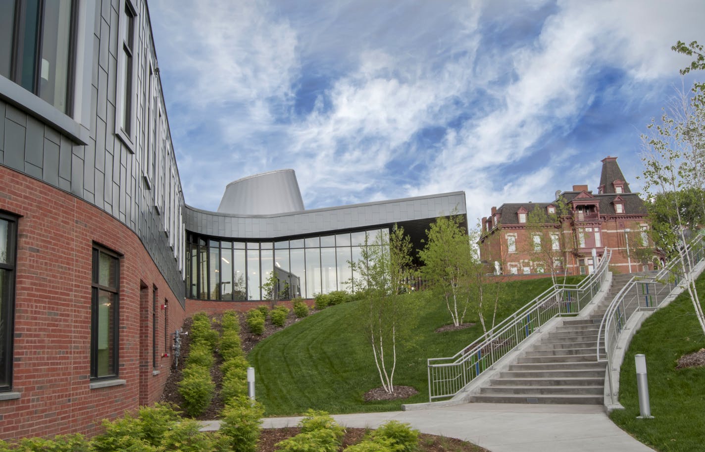 The new treatment center on the St. Paul campus of the Hazelden Betty Ford Foundation sits next to the old William Banholzer House, which was restored as part of the expansion.