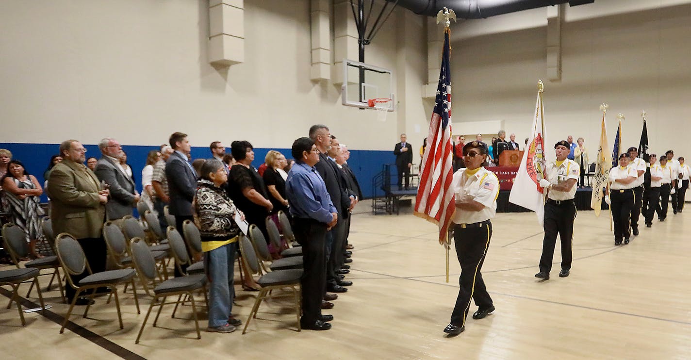 The Leech Lake Honor Guard retired the colors after a dedication ceremony Monday for the shiny new Bug-O-Nay-Ge-Shig school in Bena, north of Brainerd.