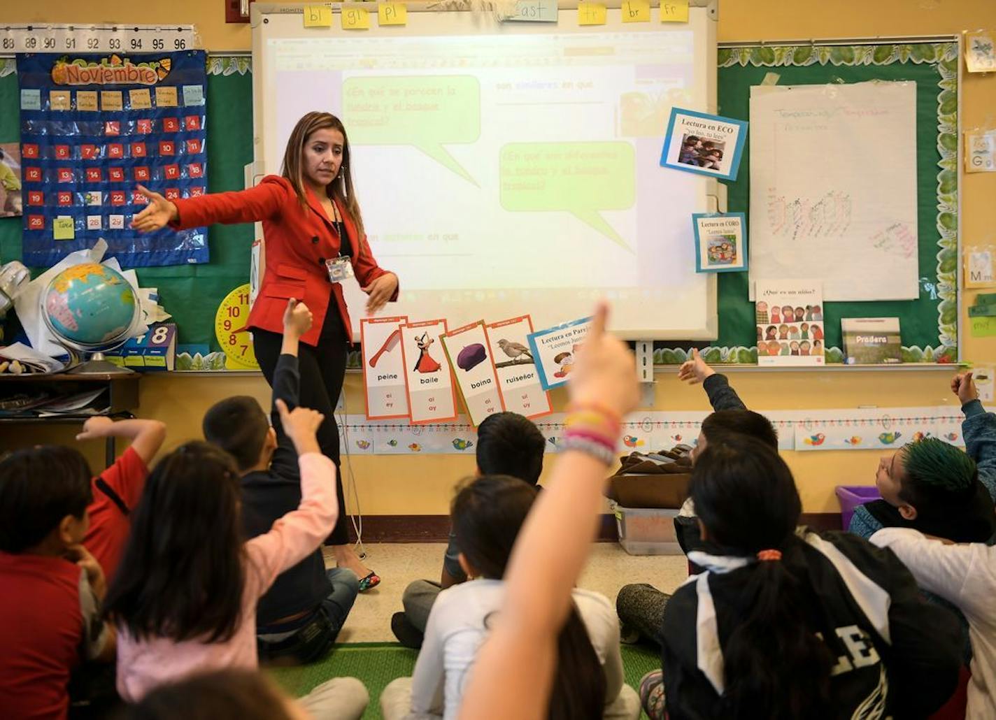 Elizabeth Ledesma instructed her 2nd grade class for native Spanish speakers Tuesday morning. She is teaching the class about different habitats.