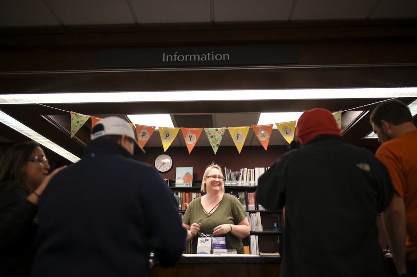 Syrena Maranell, Willmar Public Library's adult services librarian, talked about the rules before the start of Friday night's "Humans vs. Zombies" NERF gun battle at the Willmar Public Library.