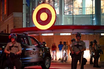 A few people were detained outside the Target in downtown Minneapolis on Thursday night after the curfew went into effect.