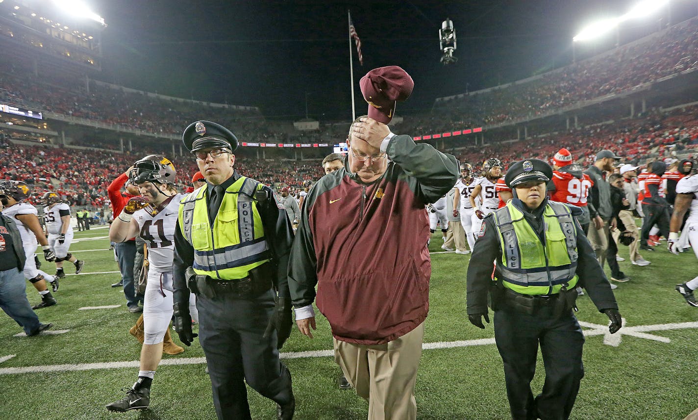 Tracy Claeys made his way off the field after the Minnesota Gophers lost to the Ohio State Buckeyes 28-14 at Ohio Stadium, Saturday, November 7, 2015 in Columbus, OH.