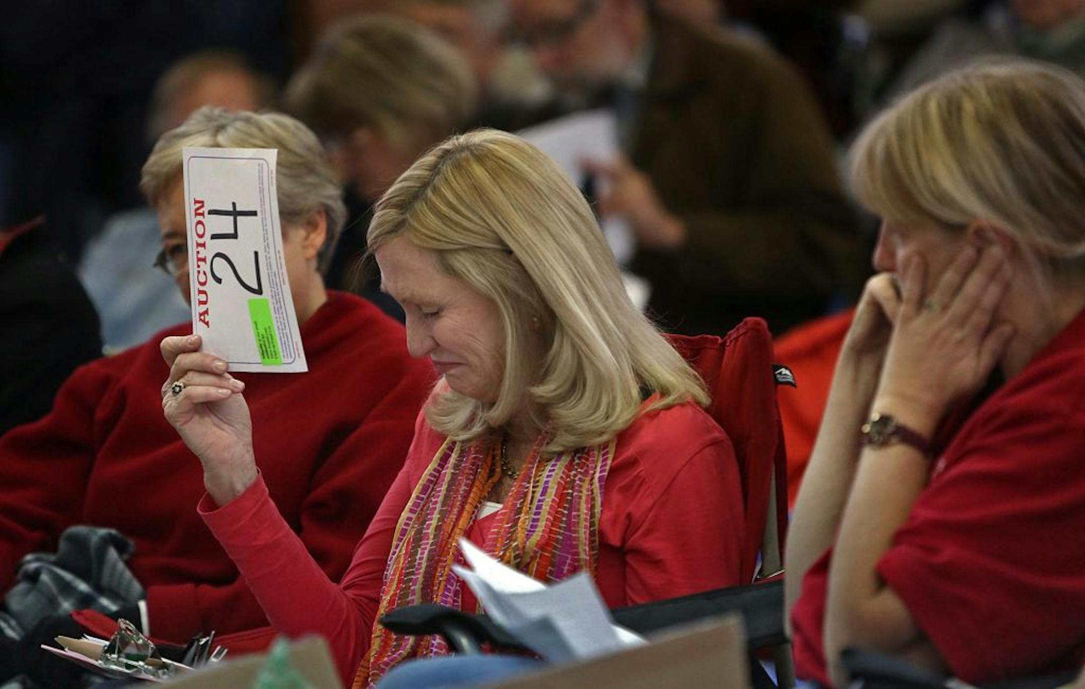 It was an emotional day for Mary Mayo Balfour Calvert, who bid for an 1889 needlepoint stitched my matriarch Abby Damon Mayo. She plans to give it to her son, Navy pilot Leonard Calvert IV, who just returned from Afghanistan.