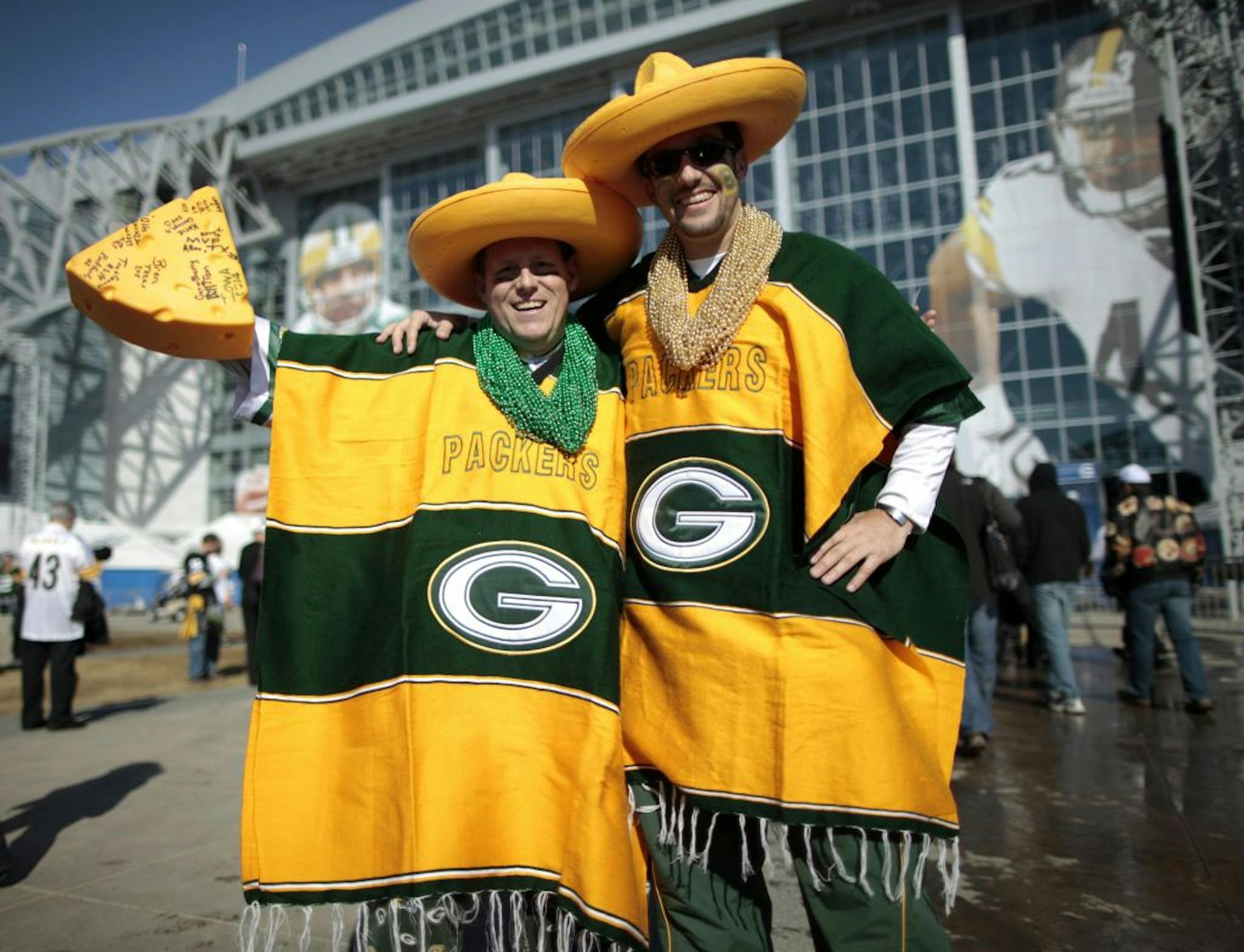Green Bay Packers fan Garland Green (L) from Stetsonville, Wisconsin and Jeff Glessing, from Lake Geneva, pose outside Cowboys Stadium prior to the NFL's Super Bowl XLV football game in Arlington, Texas, February 6, 2011. The Green Bay Packers and Pittsburgh Steelers will play in today's game. REUTERS/Lucy Nicholson