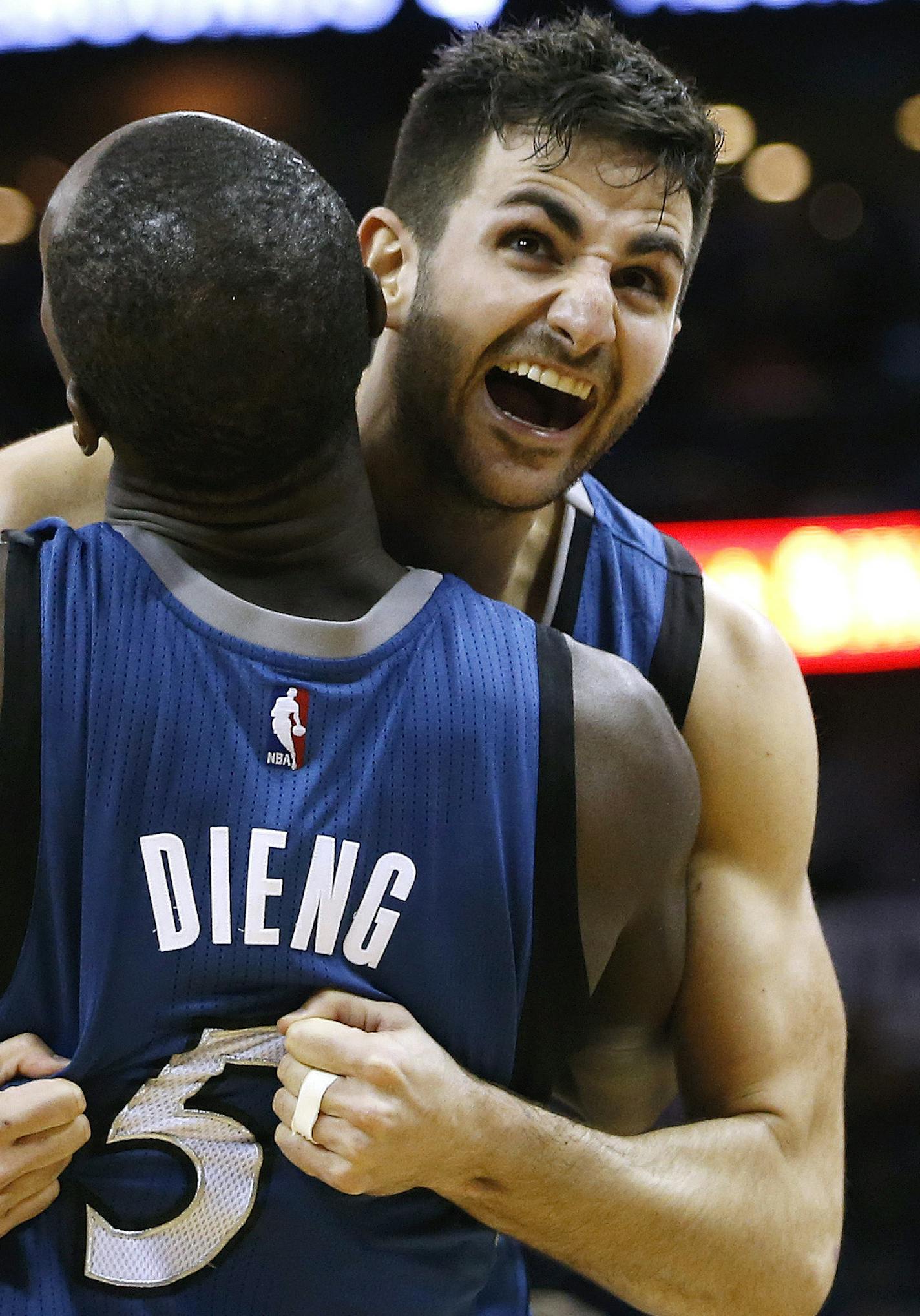 Minnesota Timberwolves guard Ricky Rubio (9) and Minnesota Timberwolves center Gorgui Dieng (5) celebrate after defeating the New Orleans Pelicans 112-110 after an NBA basketball game Saturday, Feb. 27, 2016, in New Orleans. (AP Photo/Jonathan Bachman)