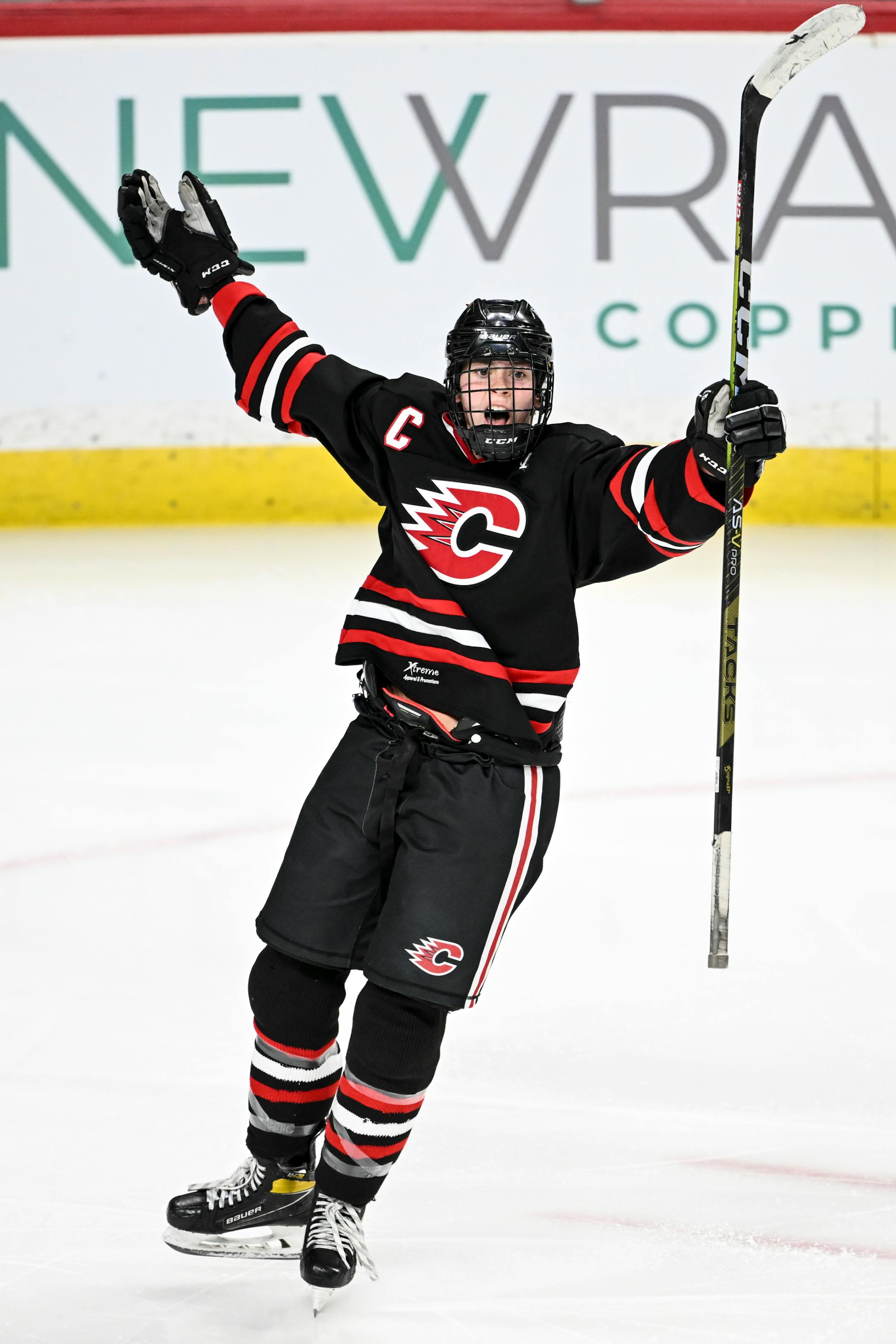 Centennial/ Spring Lake Park forward Lauren O'Hara (23) celebrates after scoring a goal against Minnetonka during the third period.