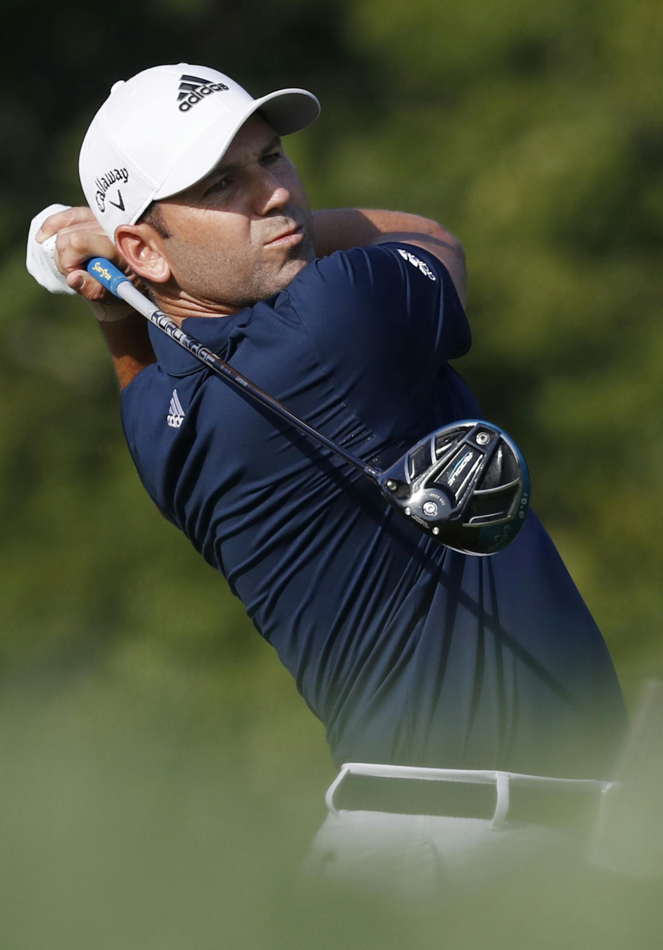 Sergio Garcia, of Spain, watches his shot off the 12th tee during the second round of the PGA Championship golf tournament at Bellerive Country Club, Friday, Aug. 10, 2018, in St. Louis. (AP Photo/Brynn Anderson)
