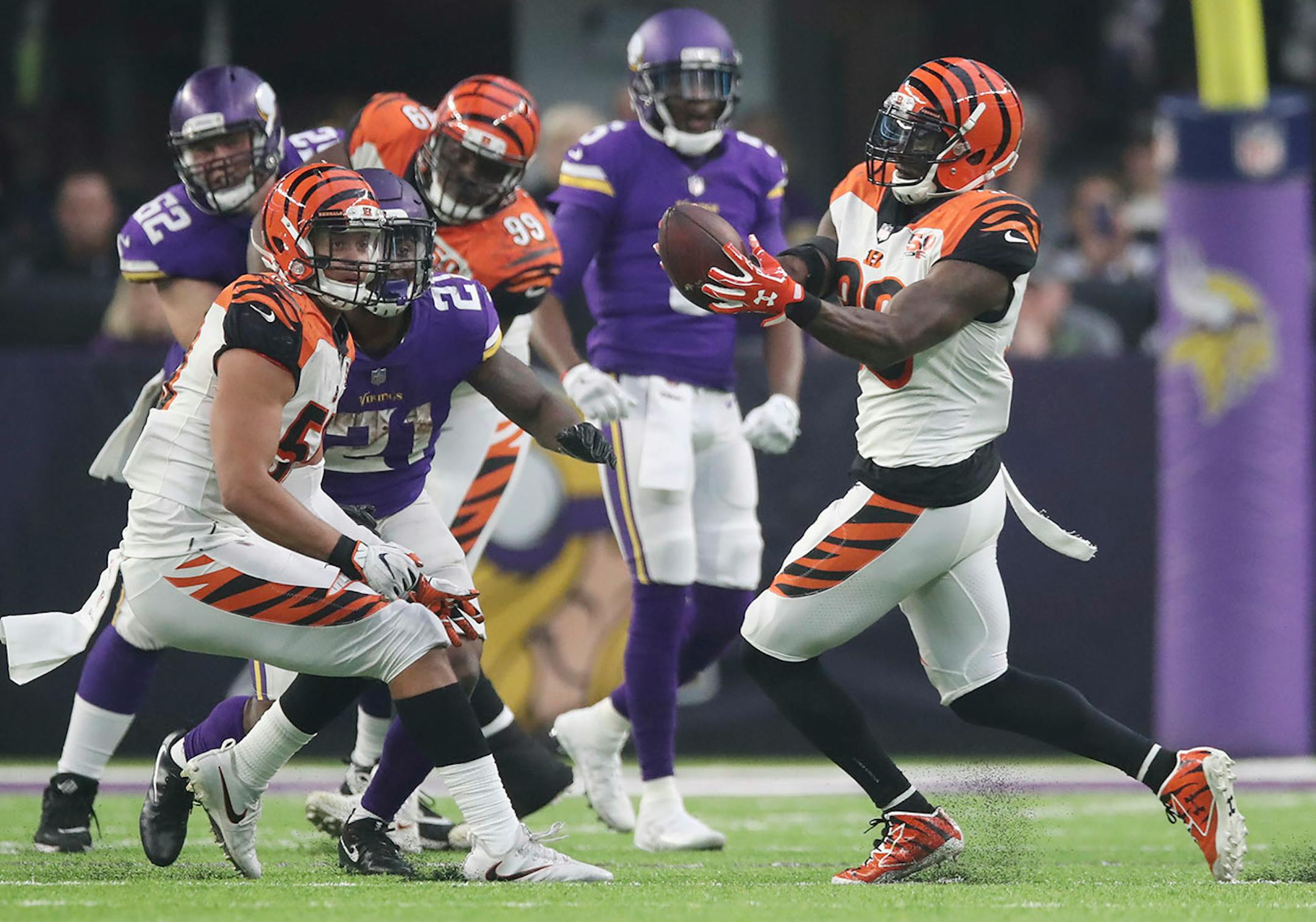 Minnesota Vikings quarterback Teddy Bridgewater (5) first pass of the season was intercepted by Cincinnati Bengals strong safety Shawn Williams (36) in the forth quarter at U.S.Bank Stadium Sunday December 17, 2017 in Minneapolis, MN.