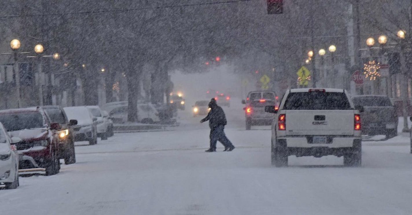 Cars warmed up on a street in Bismarck, N.D., where it is illegal to idle an unattended vehicle. Minneapolis law also prohibits idling a car for more than three minutes in a one-hour period, or for more than 15 consecutive minutes in any one-hour period when temperatures are at zero or below.