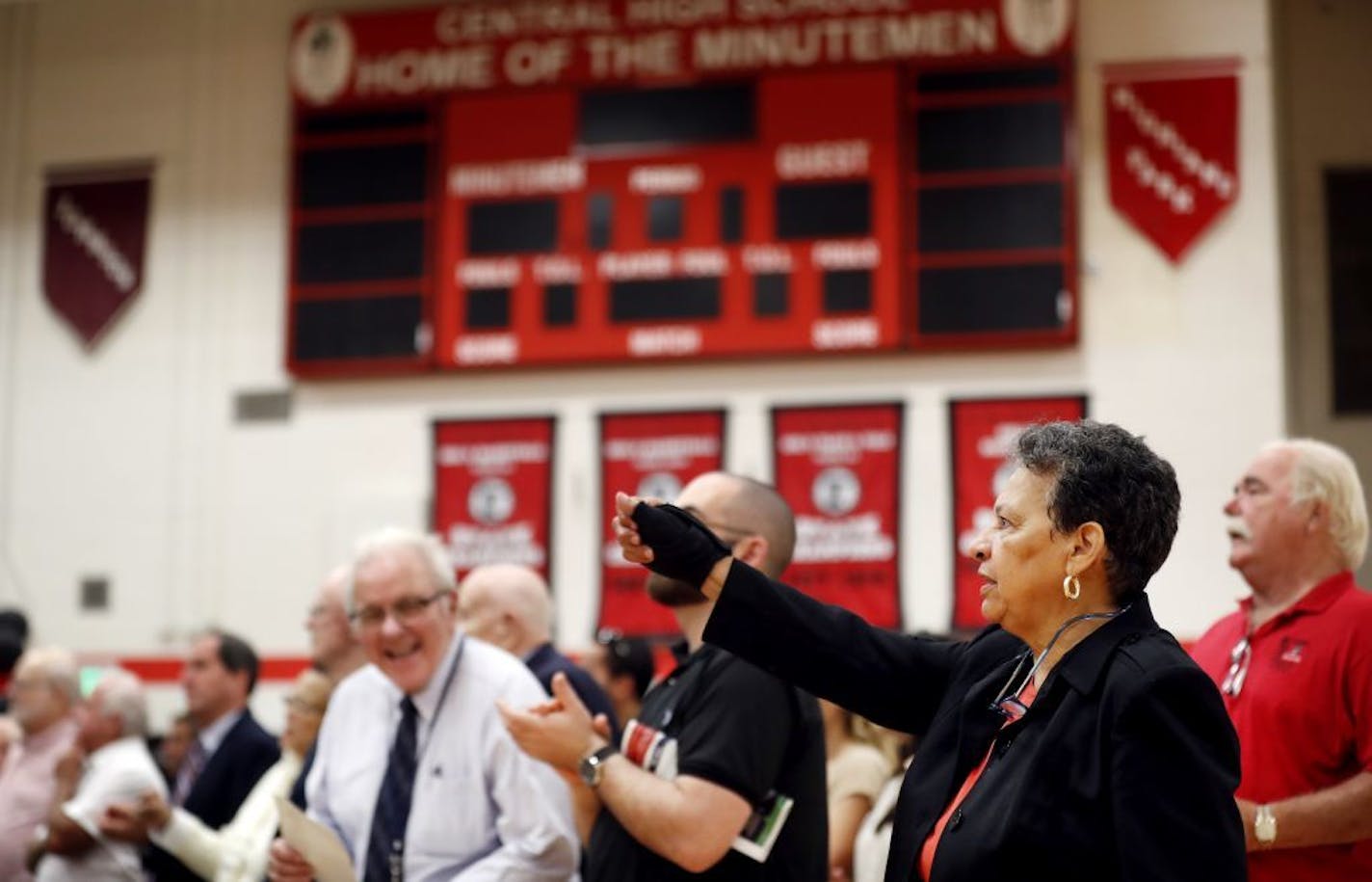 St. Paul Central High School principal Mary Mackbee stood as sung along as the school song was played Tuesday September 6, 2016 in St. Paul, MN.