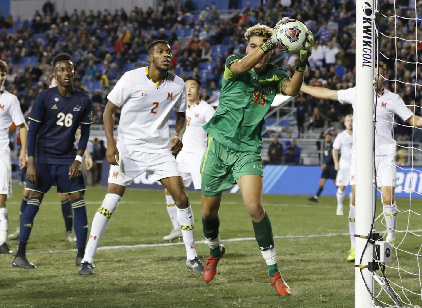 University of Maryland's Dayne St. Clair blocks the ball during the NCAA College Cup soccer championship against Akron on Dec, 9 at the University California in Santa Barbara, Calif. Maryland defeated Akron 1-0 to win the championship.