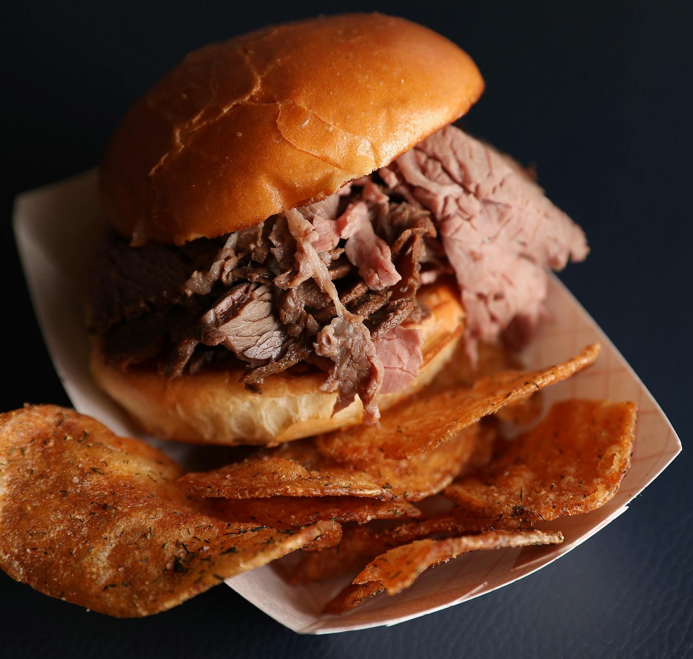 Pictured is the Murray's Steakhouse fresh-shaved smoked beef sandwich taken during a sneak preview of the new food concepts being unveiled at Target Field. ] ANTHONY SOUFFLE &#xef; anthony.souffle@startribune.com Members of the media and select season ticket holders were given a sneak preview of the new food concepts being unveiled for this baseball season Thursday, March 30, 2017 at Target Field in Minneapolis.