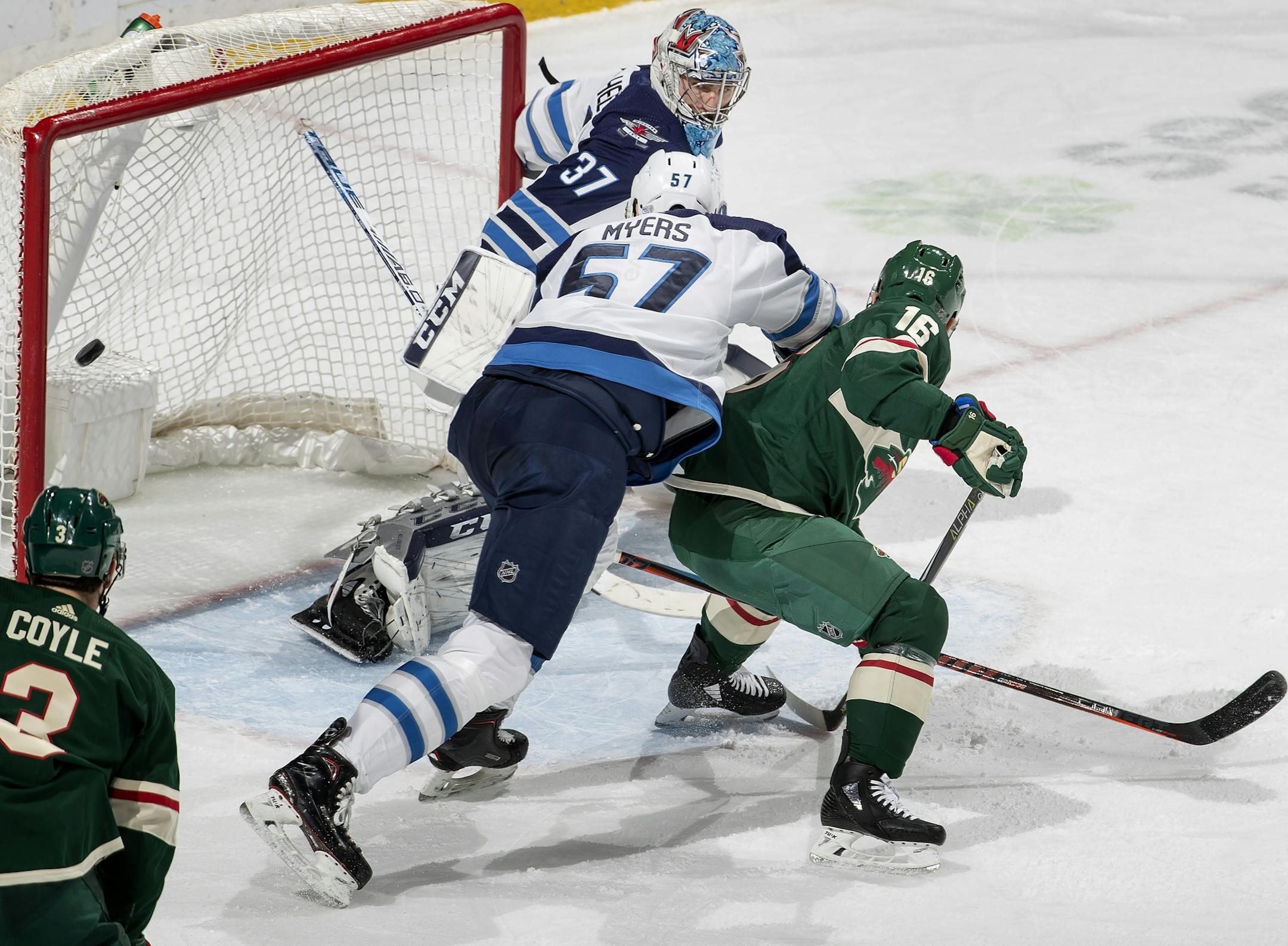 Jason Zucker (16) got the puck past Jets goalie Connor Hellebuyck (37) for a power play goal in the second period.