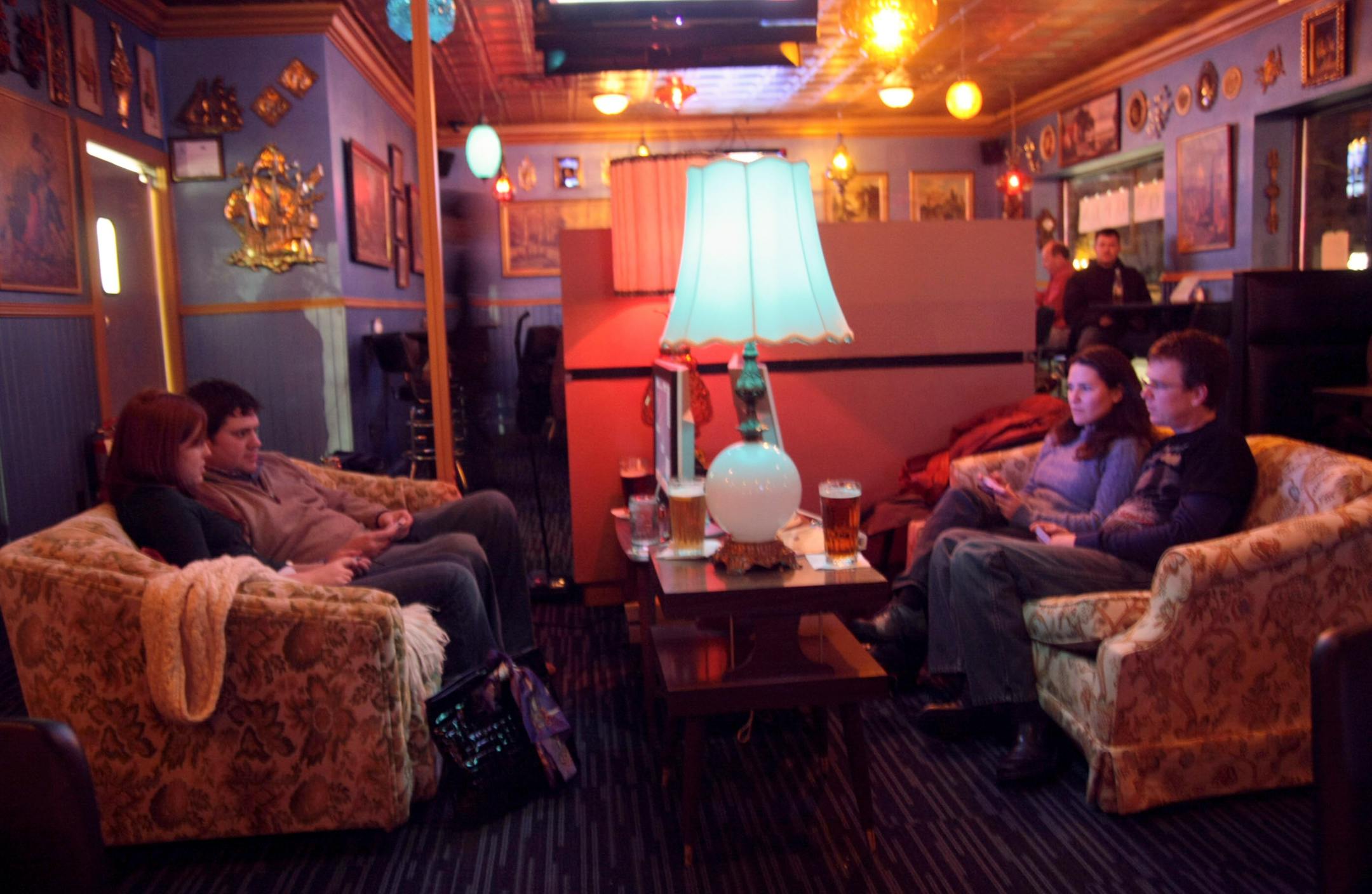It's all about beer and "Super Mario Bros" at the new Chatterbox Pub. On the couches (from left) were Kate Krueger and Lane Cowger, and Stacey and John Bryde.