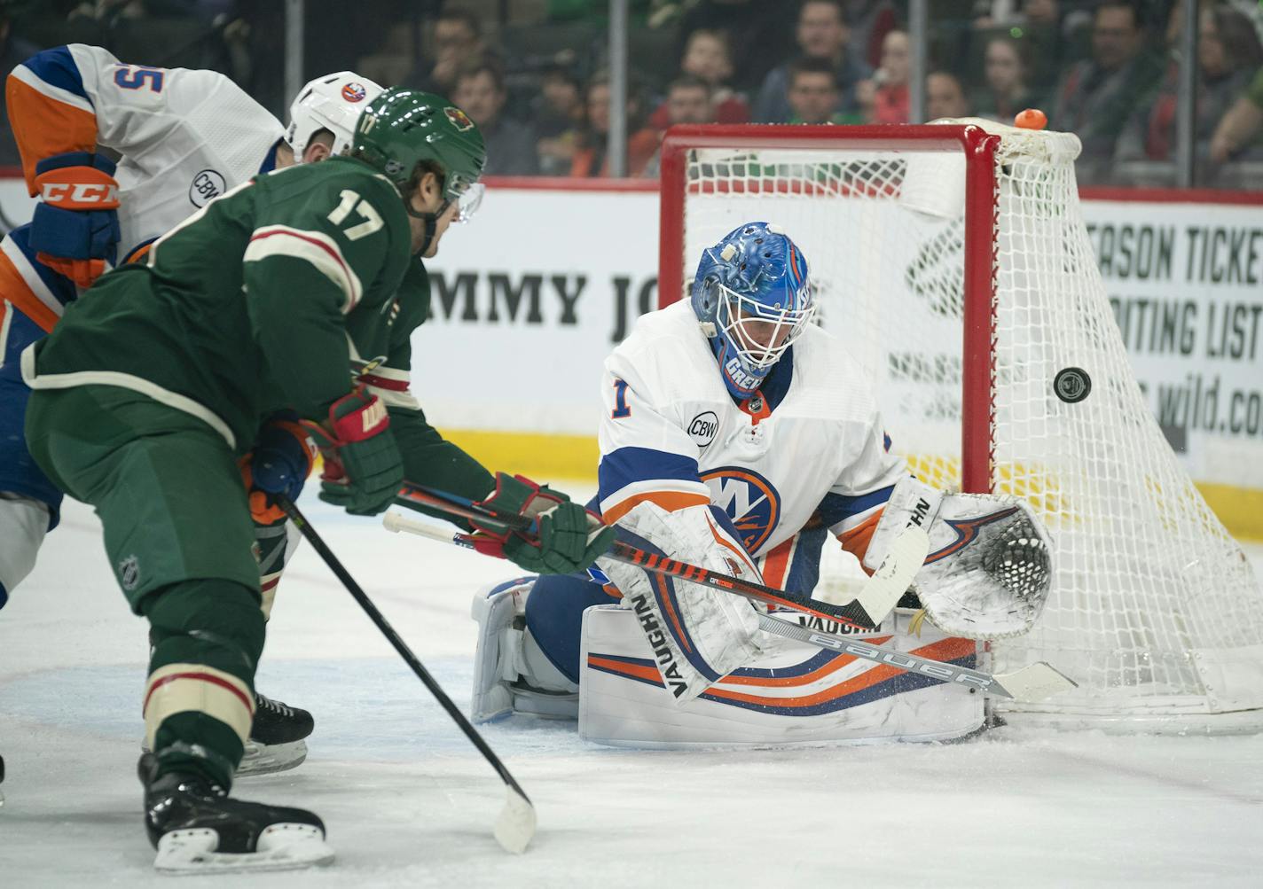 Minnesota Wild left wing Marcus Foligno's (17) backhander in the first period was a little wide of the goal and New York Islanders goaltender Thomas Greiss (1). ] JEFF WHEELER • jeff.wheeler@startribune.com The Minnesota Wild faced the New York Islanders in an NHL hockey game Sunday evening, March 17, 2019 at Xcel Energy Center in St. Paul.