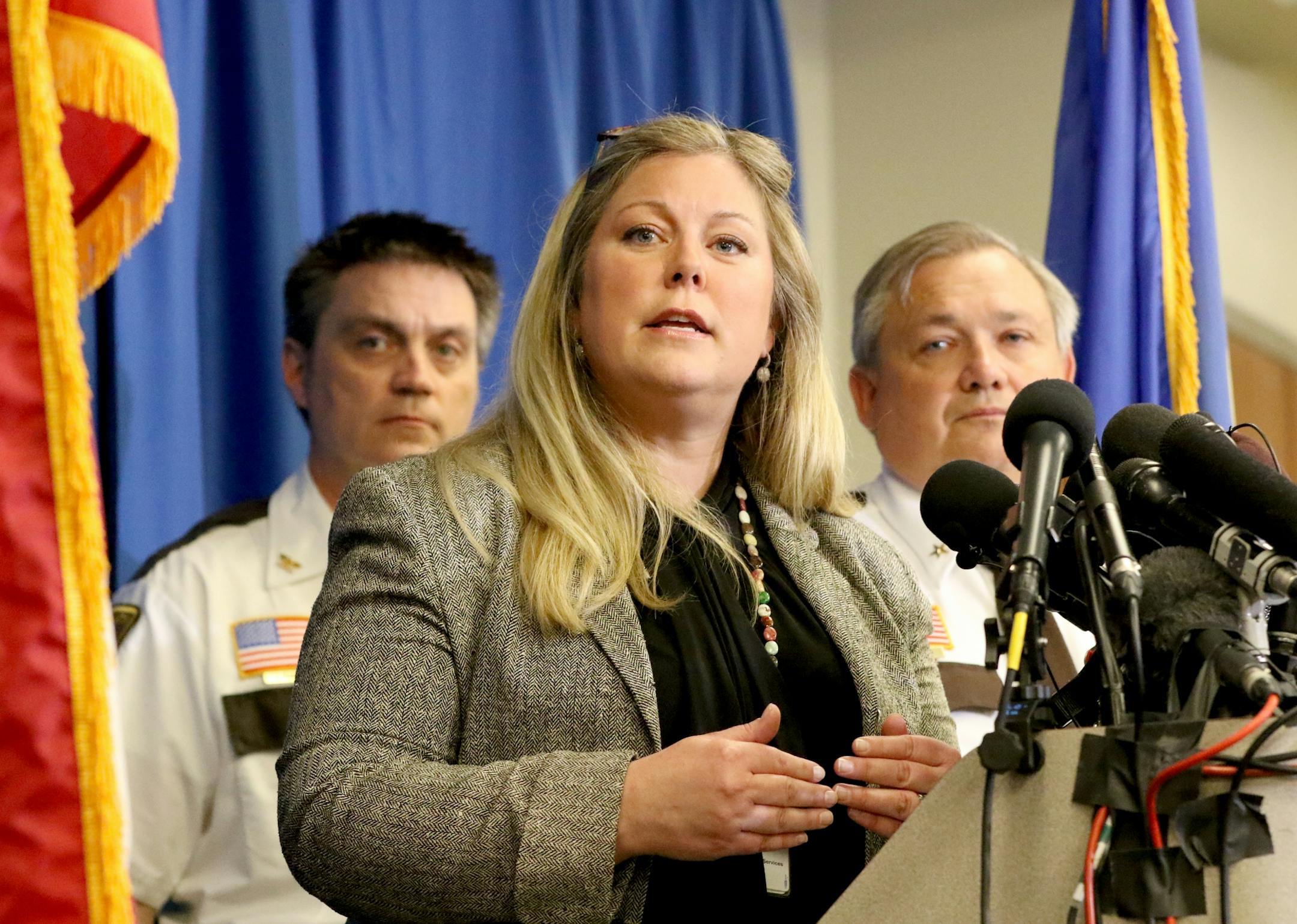 Martha Weaver, spokesperson for the Midwest Medical Examiner's Officer, answers a question as Carver County Sheriff Jim Olson, right, and Jim Kamerud chief deputy, listen in during a press conference on circumstances surrounding the death of music icon Prince Rogers Nelson on Thursday at the Carver County Justice Center Friday, April 22, 2016, in Chaska, MN.