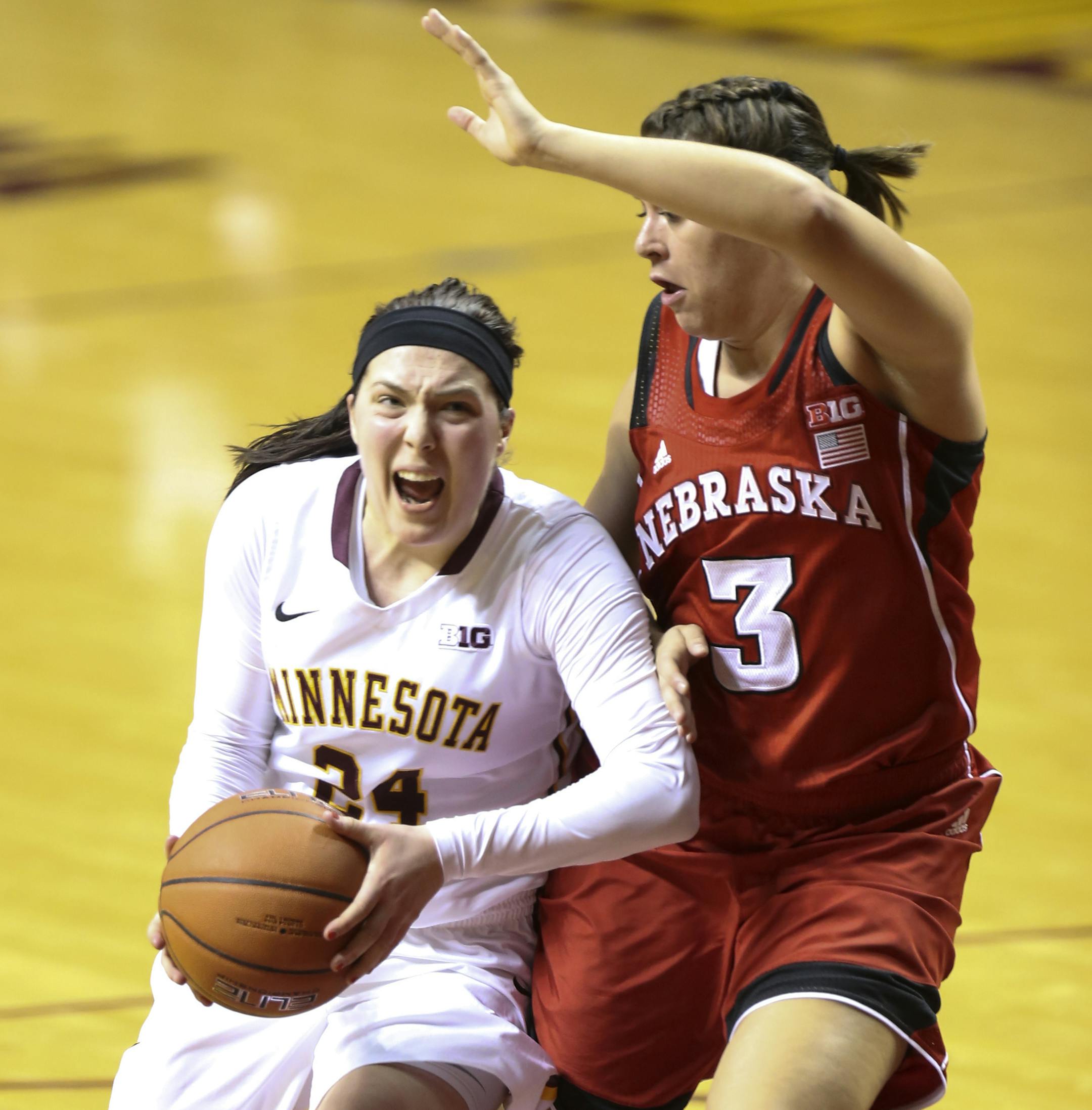 Minnesota's Mikayla Bailey (24) went for a shot against Nebraska's Haile Sample (30) during the first half. ] RENÉE JONES SCHNEIDER reneejones@startribune.com Gophers women Big Ten season opener vs. Nebraska at Williams Arena at the University of Minnesota in Minneapolis, Minn., on Monday, December 29, 2014.