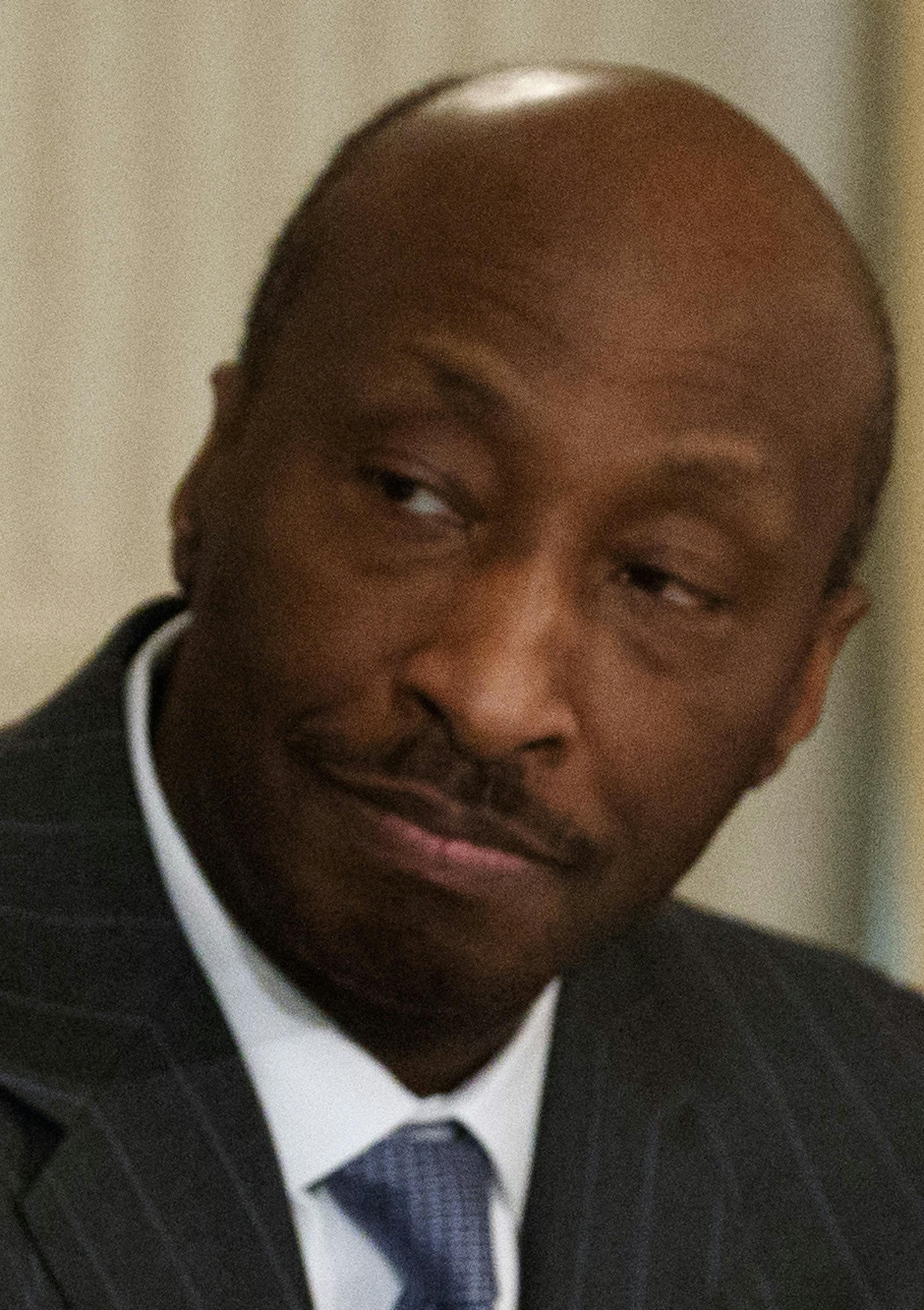 FILE - In this Thursday, Feb. 23, 2017, file photo, President Donald Trump, left, speaks during a meeting with manufacturing executives at the White House in Washington, including Merck CEO Kenneth Frazier, center, and Ford CEO Mark Fields. Frazier is resigning from the Presidentís American Manufacturing Council citing "a responsibility to take a stand against intolerance and extremism." Frazier's resignation comes shortly after a violent confrontation between white supremacists and protest
