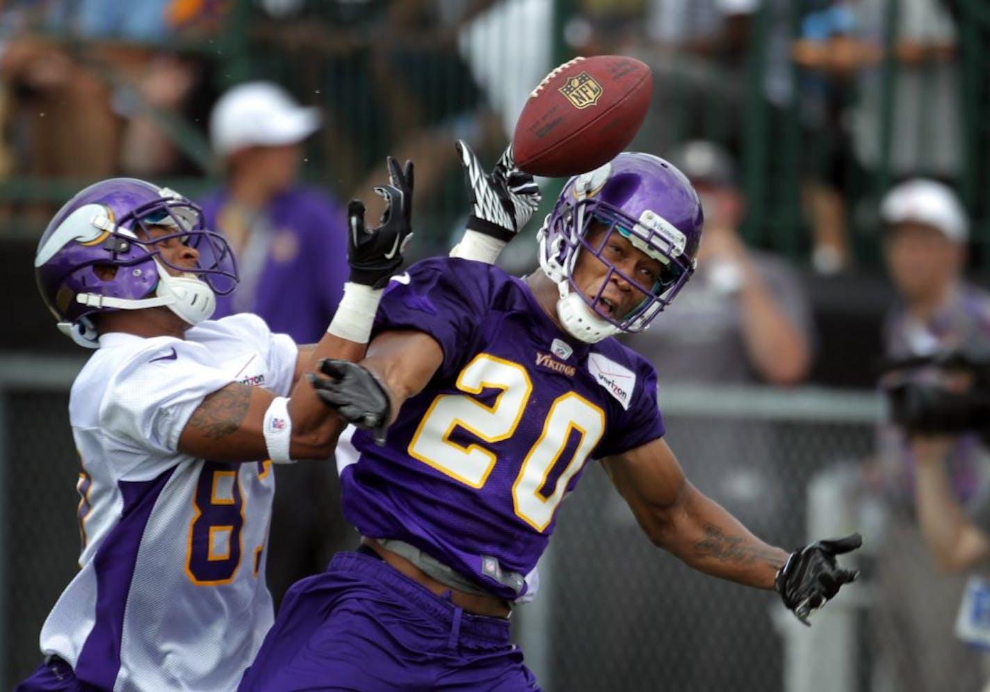 Chris Cook at right broke up a pass intended for receiver A.J. Love at right during the second day of Vikings practice at Minnesota State University, Mankato Saturday July 28, 2012 Mankato ,MN .