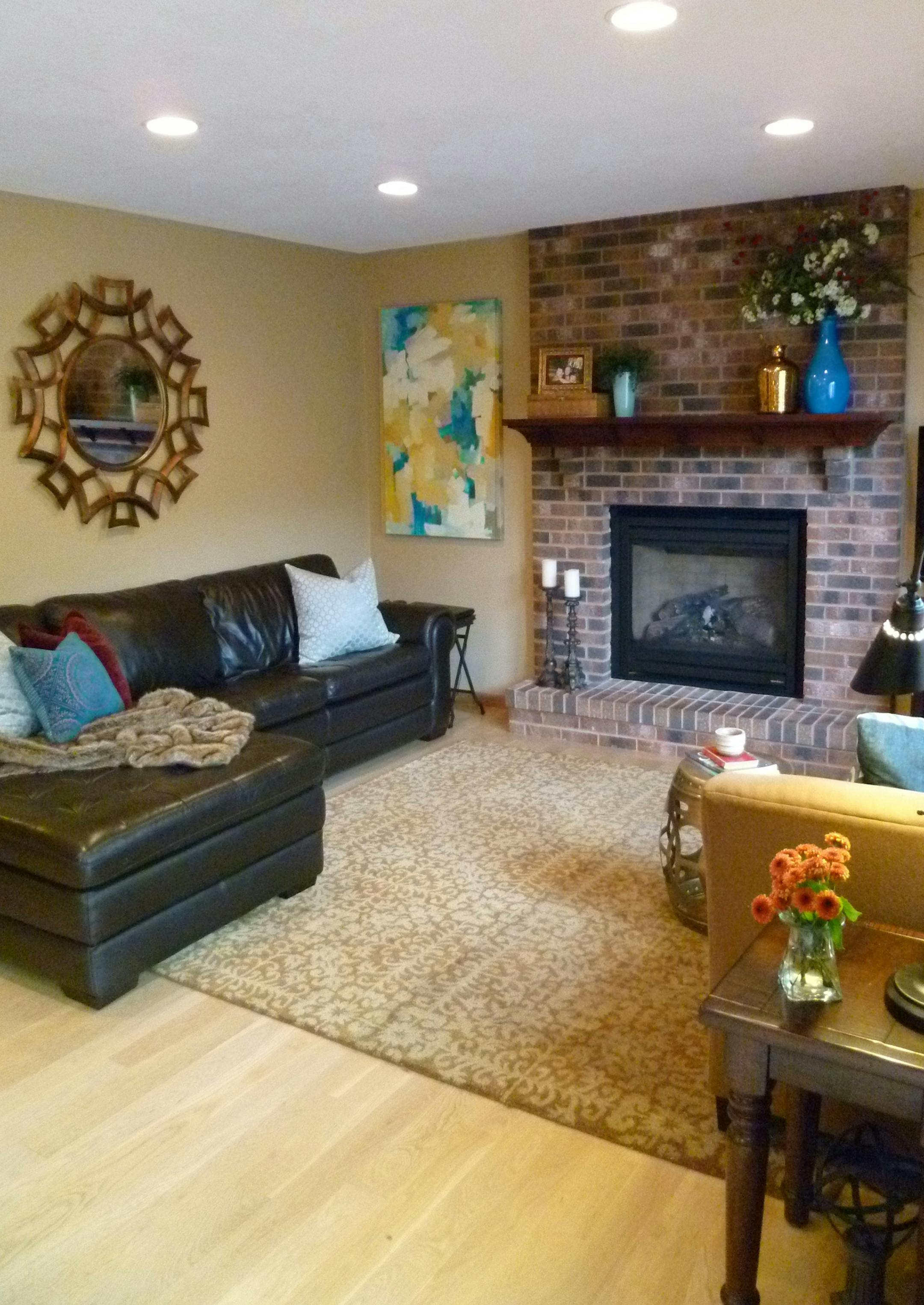 Family room in Woodbury was transformed by designer Jeralyn Mohr using spray paint, a piece of custom art and Craigslist finds.