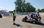 Blaine police officer Joe Matzke directed traffic Wednesday at the 3M Open golf tournament.