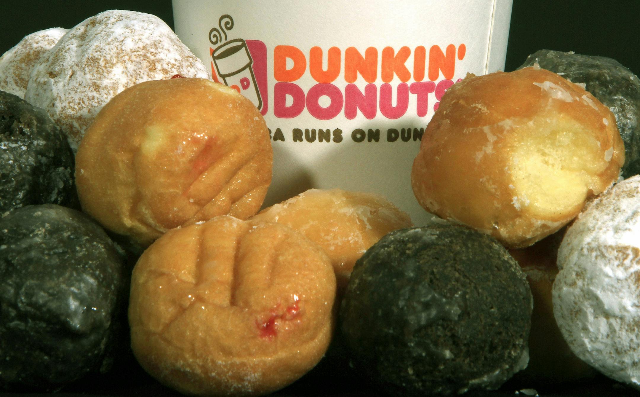 FILE - In this July 27, 2011 file photo, Dunkin' Donuts products are displayed in Montpelier, Vt. Dunkin' Brands Group Inc., which went public last month, said Wednesday, Aug. 3, 2011, that its second-quarter earnings were nearly flat as the company focused on its U.S. expansion efforts and aggressive growth overseas.(AP Photo/Toby Talbot, File)