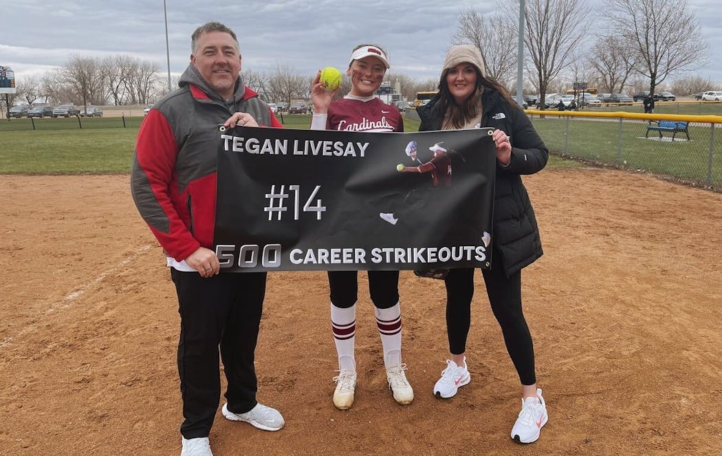 Tegan Livesay with her parents, Tim and Melissa.