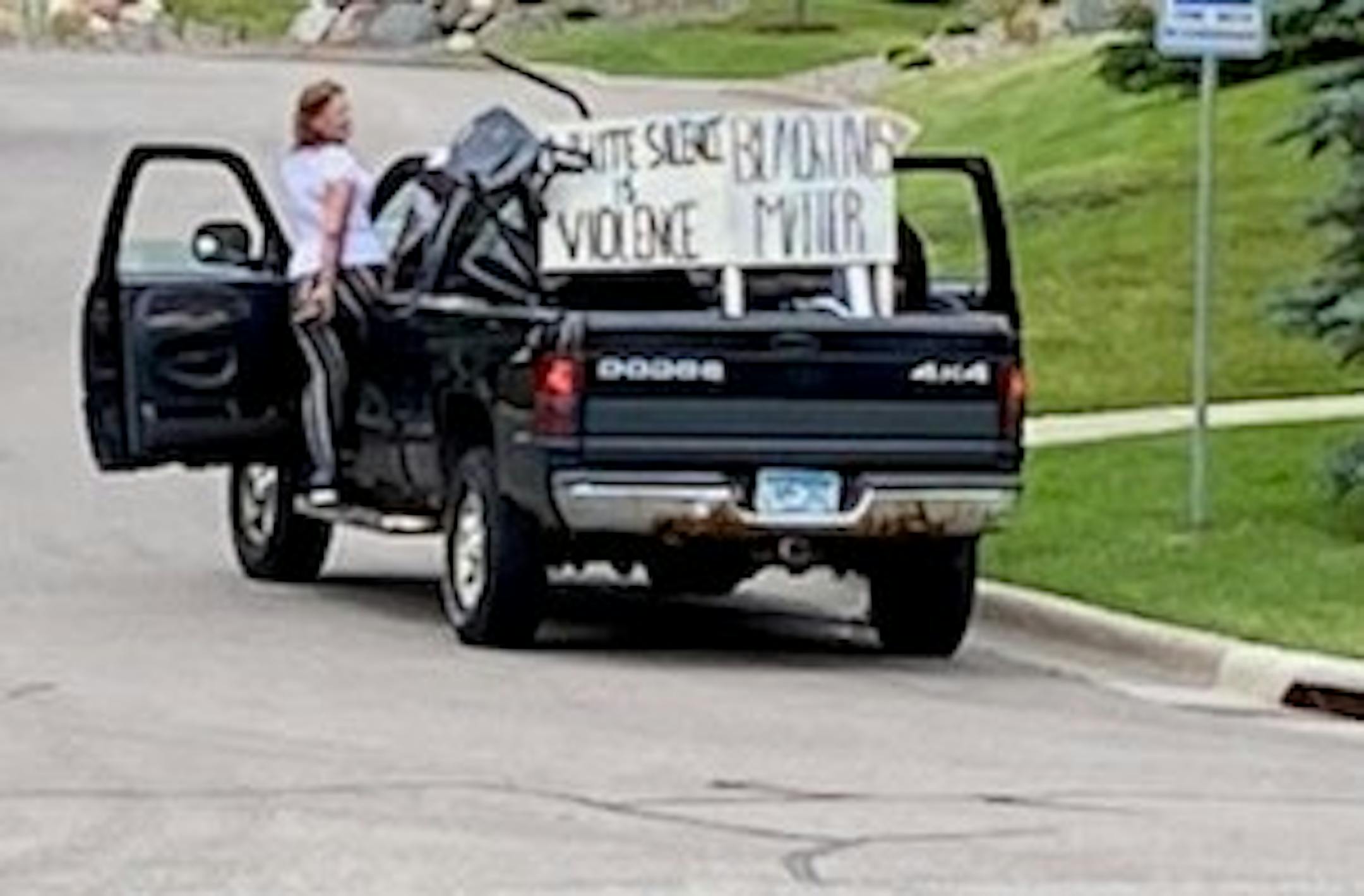 Roseville police are seeking the public's help in identifying the man and woman seen stealing yard signs in this photo. They were taken June 19.