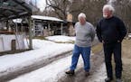 Mel Jacobson, left, an 85-year-old from Minnetonka who retreated to his remote cabin across the St. Croix River to wait out the Coronavirus pandemic, 