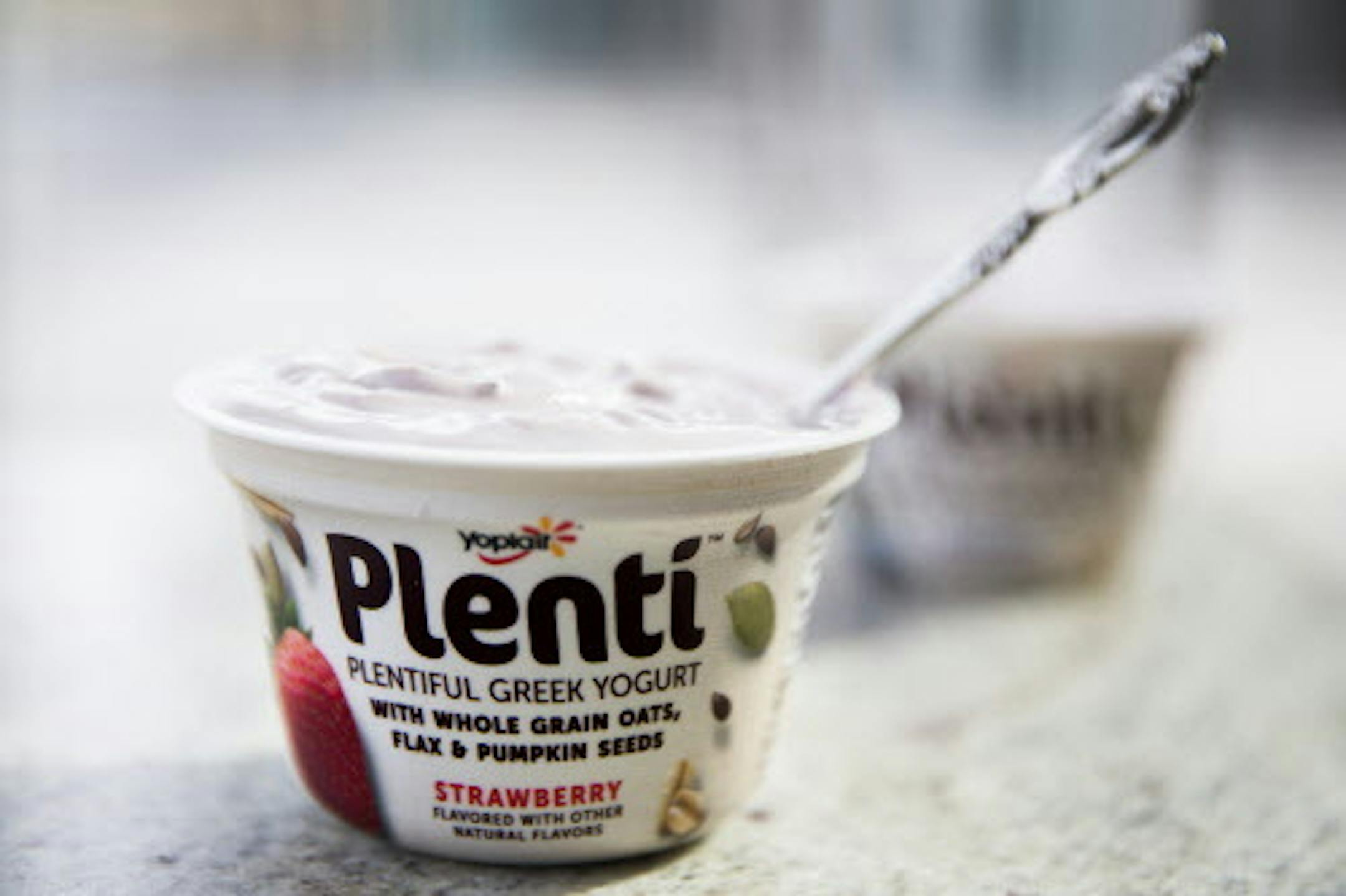 A new product from Yoplait called Plenti, a Greek yogurt with oats, nuts and seeds blended in at General Mills headquarters in Golden Valley on Thursday, March 12, 2015. ] LEILA NAVIDI leila.navidi@startribune.com /