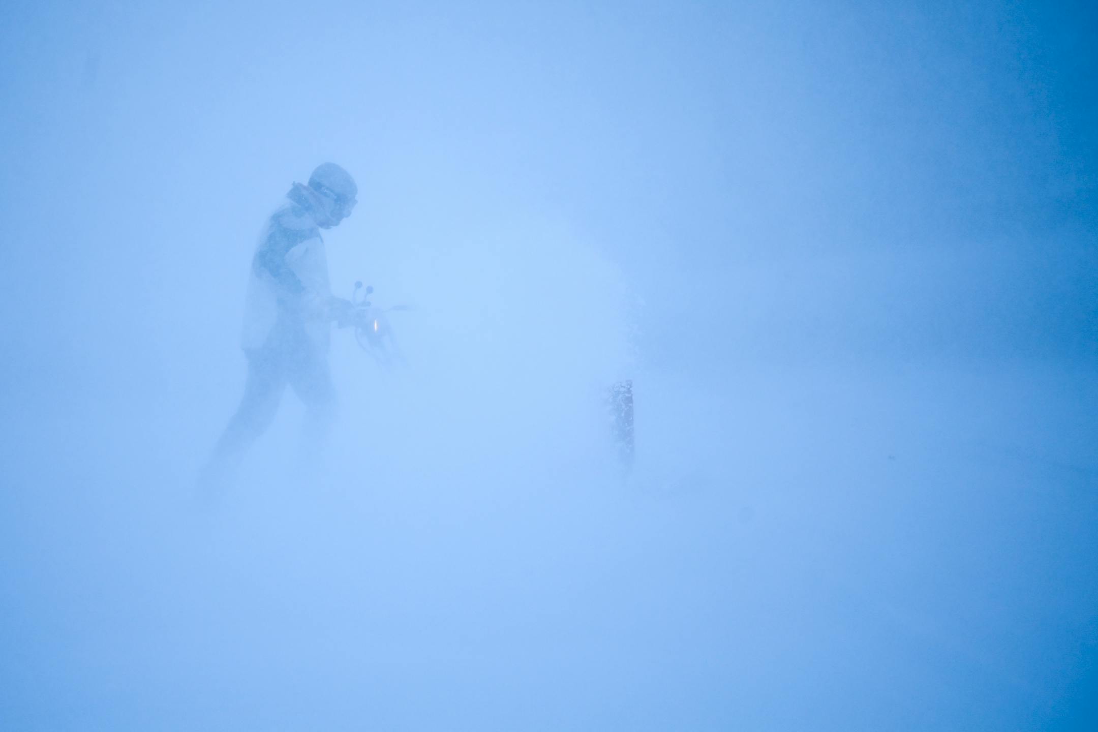 Tim Keefe, of Robbinsdale, used a snowblower to clear his driveway during Wednesday night's snowstorm.