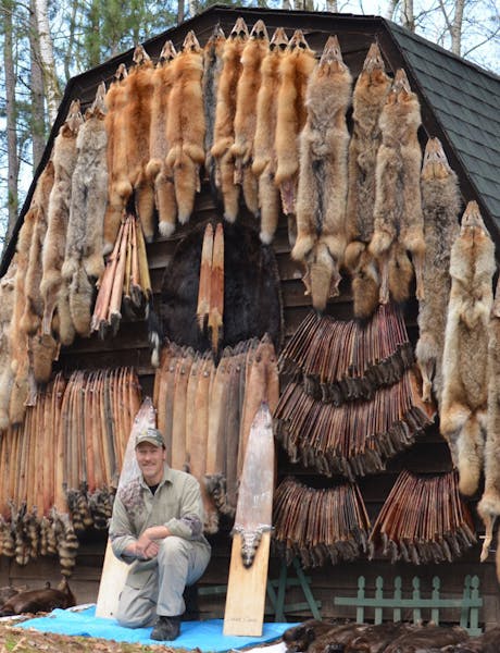 Andy Shoemaker, who lives just north of the Twin Cities, with his trappiing bounty following the 2011-1012 season.