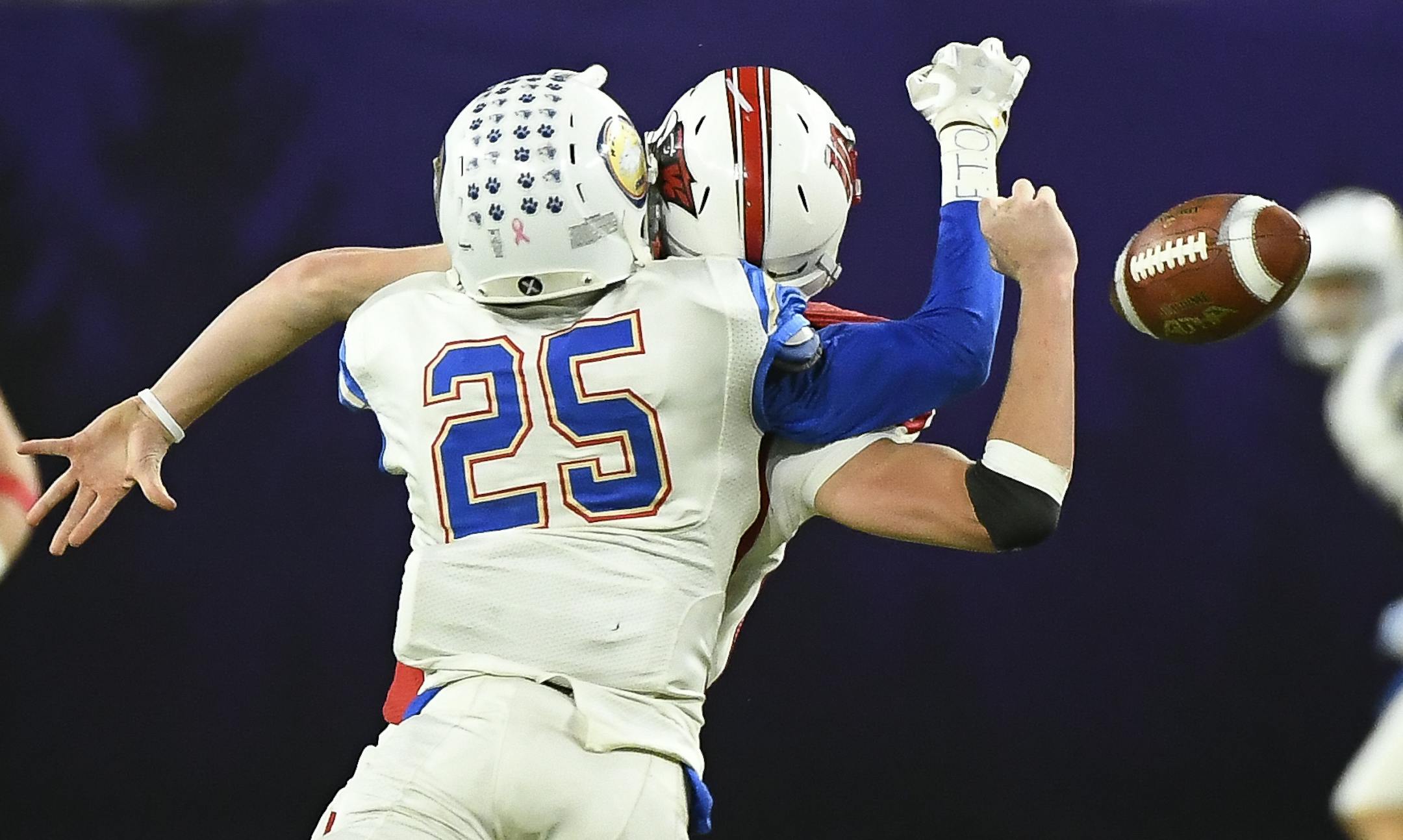SMB Wolfpack'sTrevon Howard (25) forced a fumble by Willmar quarterback Drey Dirksen (10) in the last play of the second quarter. ] Aaron Lavinsky • aaron.lavinsky@startribune.com Willmar played SMB in the Class 4A state tournament championship football game on Friday, Nov. 23, 2018 at US Bank Stadium in Minneapolis, Minn.
