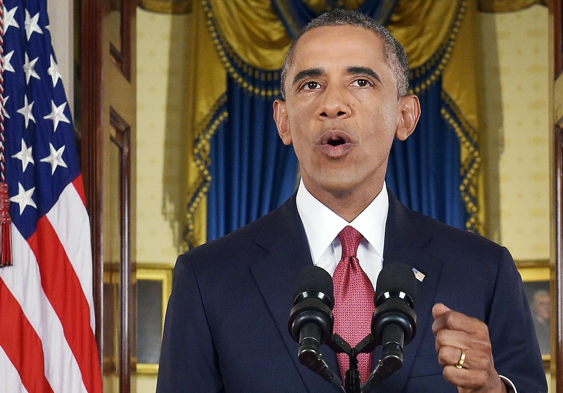 President Barack Obama addresses the nation from the Cross Hall in the White House in Washington, Wednesday, Sept. 10, 2014. In a major reversal, Obama ordered the United States into a broad military campaign to √¨degrade and ultimately destroy√Æ militants in two volatile Middle East nations, authorizing airstrikes inside Syria for the first time, as well as an expansion of strikes in Iraq. (AP Photo/Saul Loeb, Pool) ORG XMIT: MIN2014091020401792