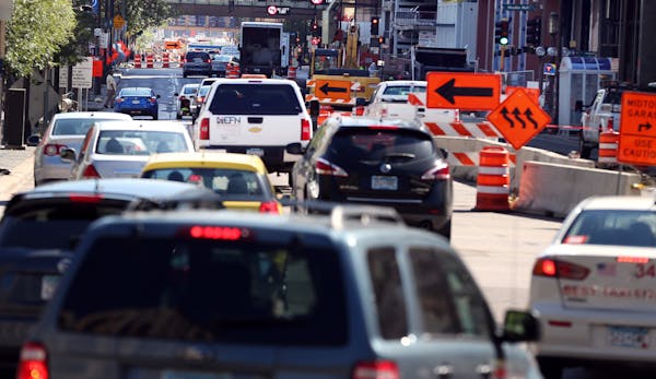 Heavy traffic on 4th street due road construction continued to cause delays in downtown Monday September 21, 2015 in Minneapolis, MN. ] Jerry Holt/ Je