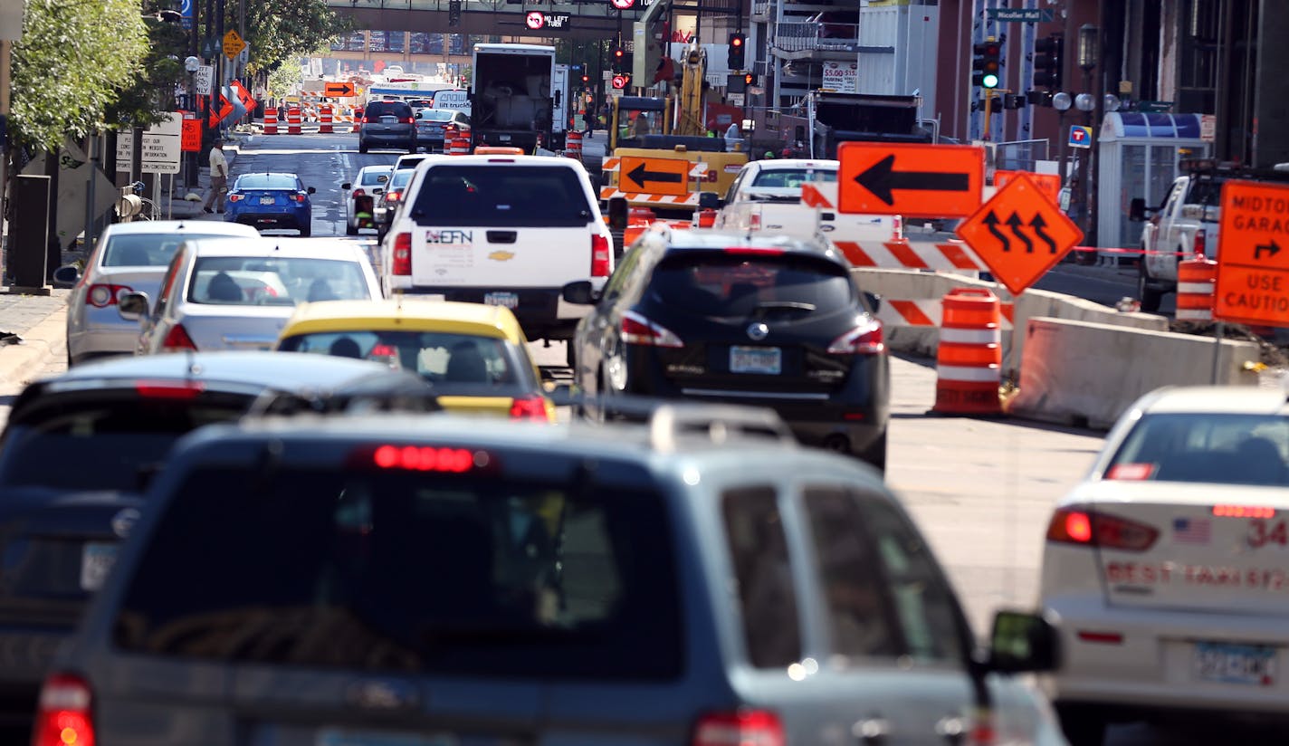 Heavy traffic on 4th street due road construction continued to cause delays in downtown Monday September 21, 2015 in Minneapolis, MN. ] Jerry Holt/ Jerry.Holt@Startribune.com