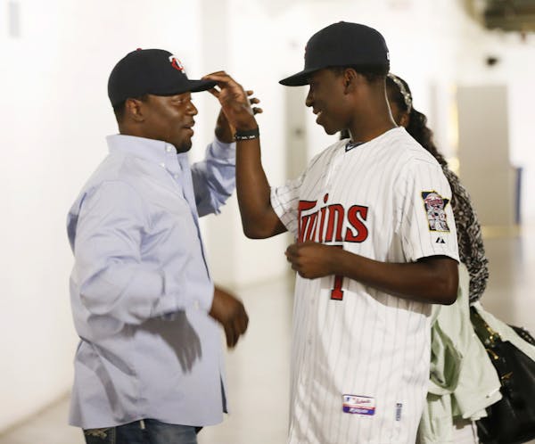 Nick Gordon right tipped his father Tom "Flash" Gordon hat before he was introduced to the Twin Cities media. Twins sign shortstop Nick Gordon from Ol