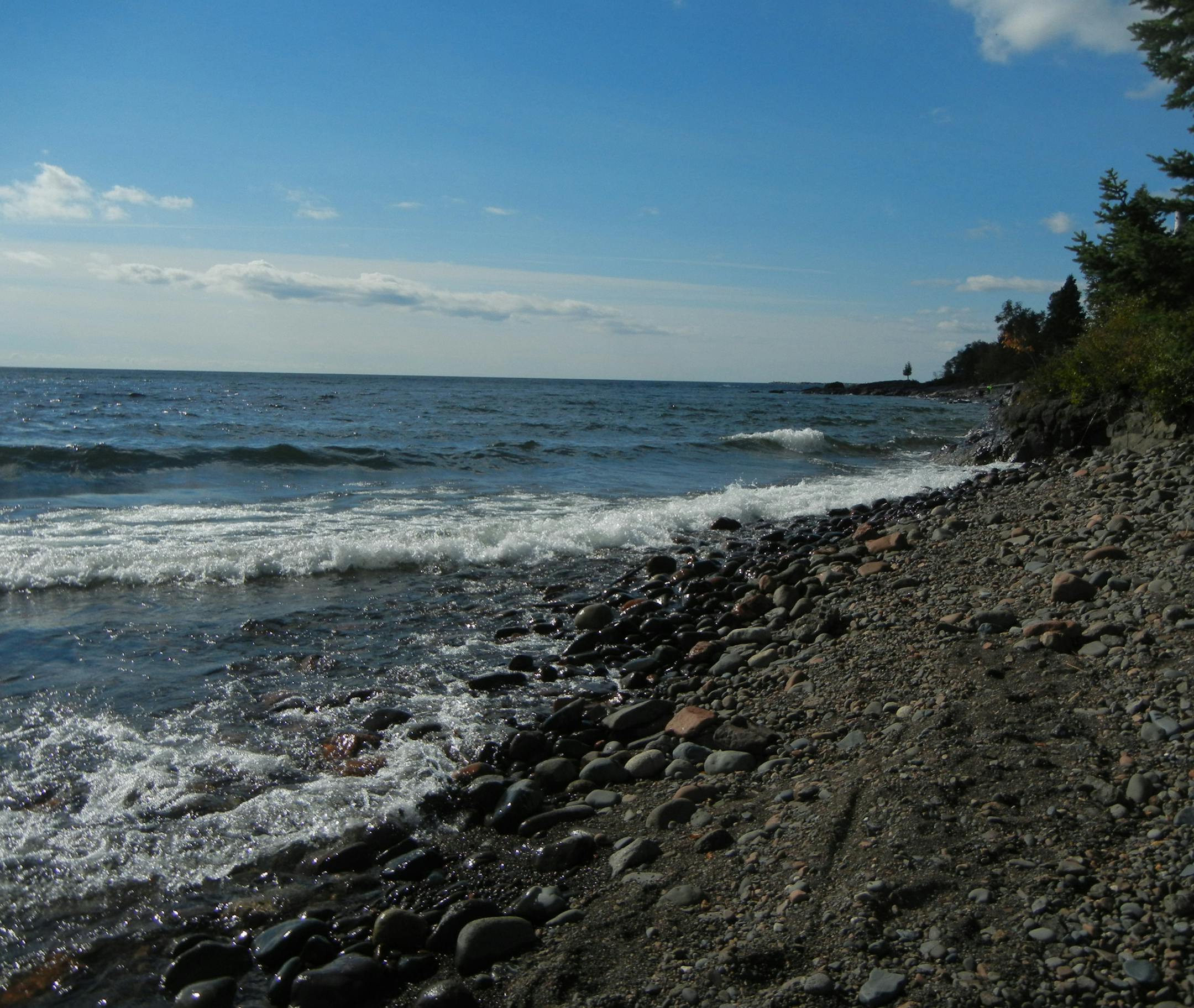 Watching Superior on a fall day with warm sunshine melts away the stress of daily life. Photo by Sue Campbell * Star Tribune