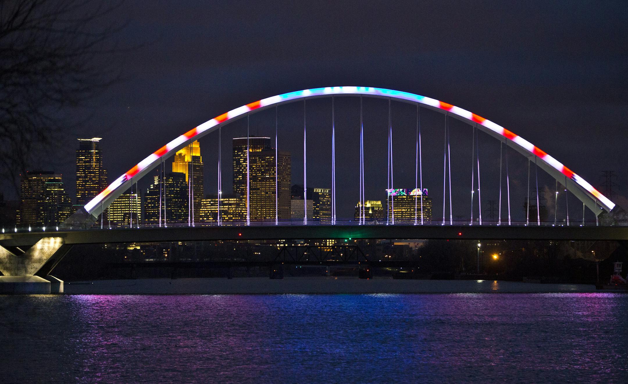 Lowry Avenue Bridge in MInneapolis was lit up red, white and blue in honor of Veterans Day on Monday, November 12, 2012. The high-efficiency, color adjustable LED lighting system for the arches will periodically change, depending on holidays or events taking place. ] (RENEE JONES SCHNEIDER &#x201a;&#xc4;&#xa2; reneejones@startribune.com Minneapolis, MN 11/12/2012)