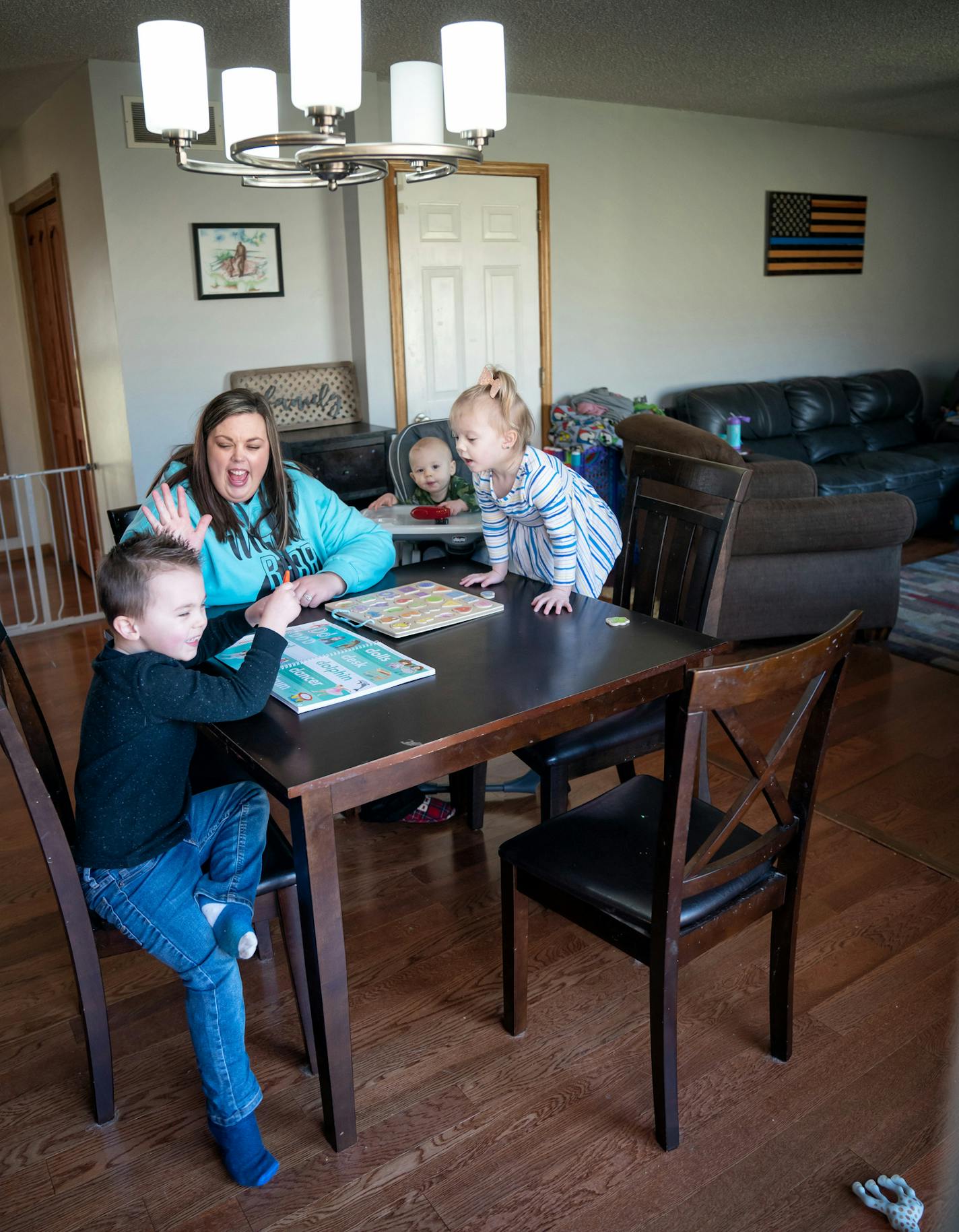 Emily Allen, a nurse who is working at Bethesda Hospital - which is handling COVID-19 cases - worked and played with her kids on her day off. Leo, 4, worked on letters of the alphabet, Lilly, 3 worked on numerals while Sully, 11 months watched and tried to join in. She told them if they studied, then they could go outside and do sidewalk chalk in the driveway. ] GLEN STUBBE &#x2022; glen.stubbe@startribune.com Wednesday, April 1, 2020