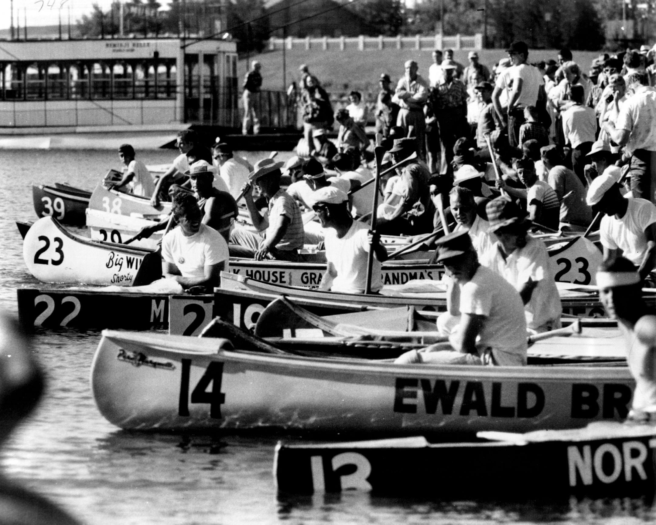 July 7, 1960: AQUATENNIAL CANOE DERBY'S 46 ENTRIES WAITED FOR SIGNAL TO ENTER LAKE BEMIDJI All but two finished the first lap of 54 miles to Bena, Minn.