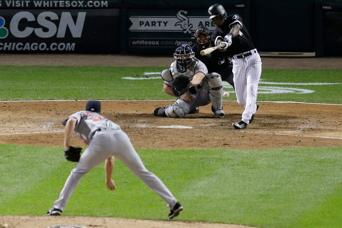 Chicago White Sox's Tim Anderson hits the game-winning single off Minnesota Twins relief pitcher Trevor Hildenberger during the ninth inning of a baseball game Wednesday, Aug. 23, 2017, in Chicago. The White Sox won 4-3. (AP Photo/G-Jun Yam)