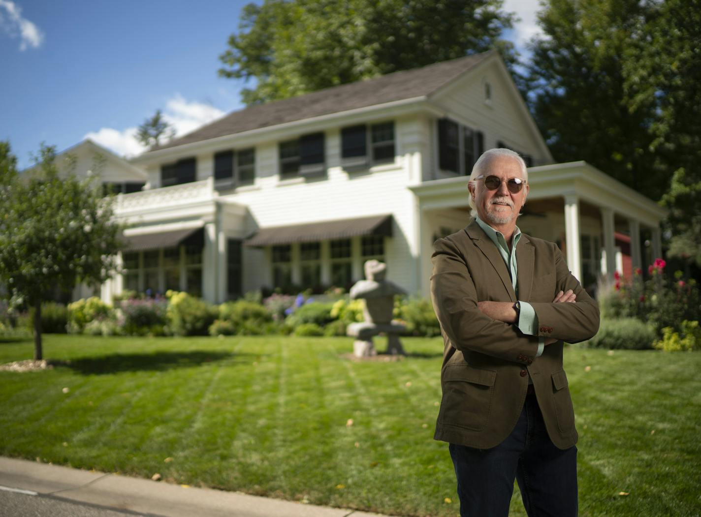 Don Shelby outside the Excelsior home he updated to be energy efficient. ] JEFF WHEELER • jeff.wheeler@startribune.com Former television anchor Don Shelby has an energy-efficient home that blends right in with the traditional homes in his Excelsior neighborhood. He was photographed Thursday afternoon, September 3, 2020 at Target Field in Excelsior.